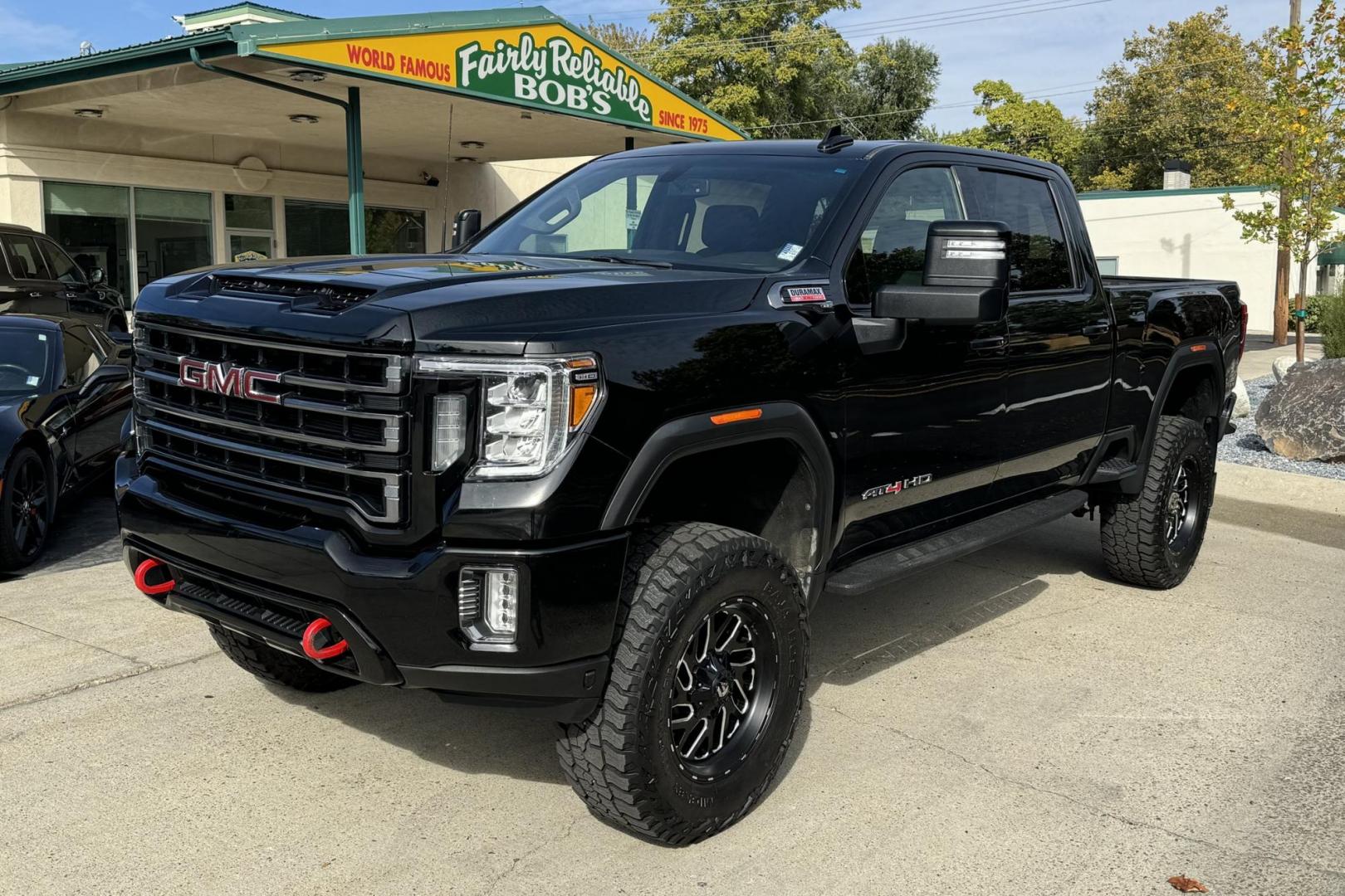 2022 Black /Black GMC Sierra 3500HD AT4 (1GT49VEY4NF) with an V8 6.6 Liter Duramax Diesel engine, Automatic 10 Speed transmission, located at 2304 W. Main St., Boise, ID, 83702, (208) 342-7777, 43.622105, -116.218658 - Truck With Attitude! - Photo#0