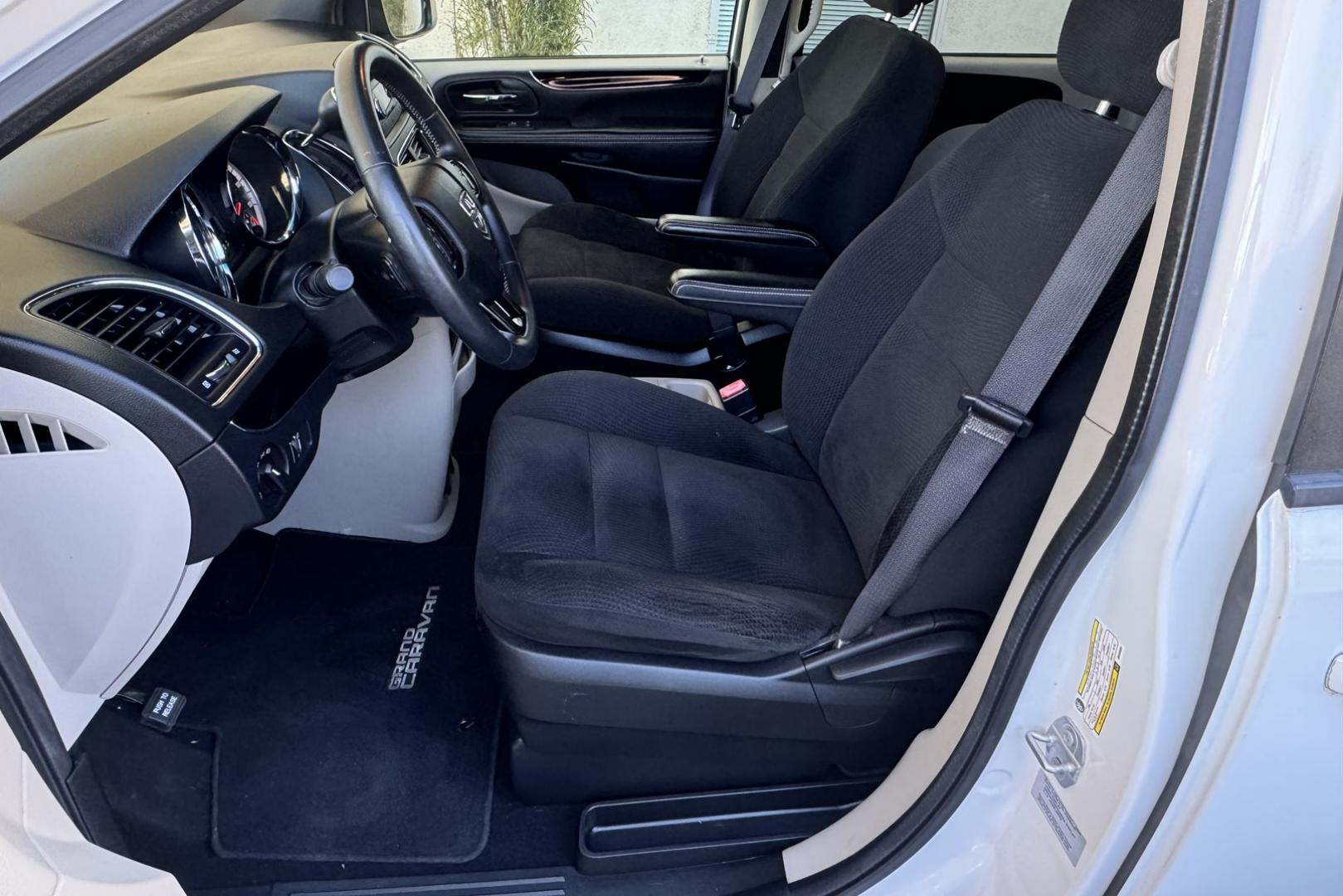 2016 White /Black Dodge Grand Caravan SE Plus (2C4RDGBG6GR) with an V6 3.6 Liter engine, Automatic transmission, located at 2304 W. Main St., Boise, ID, 83702, (208) 342-7777, 43.622105, -116.218658 - Stow And Go Seating! 7 Passenger - Photo#5