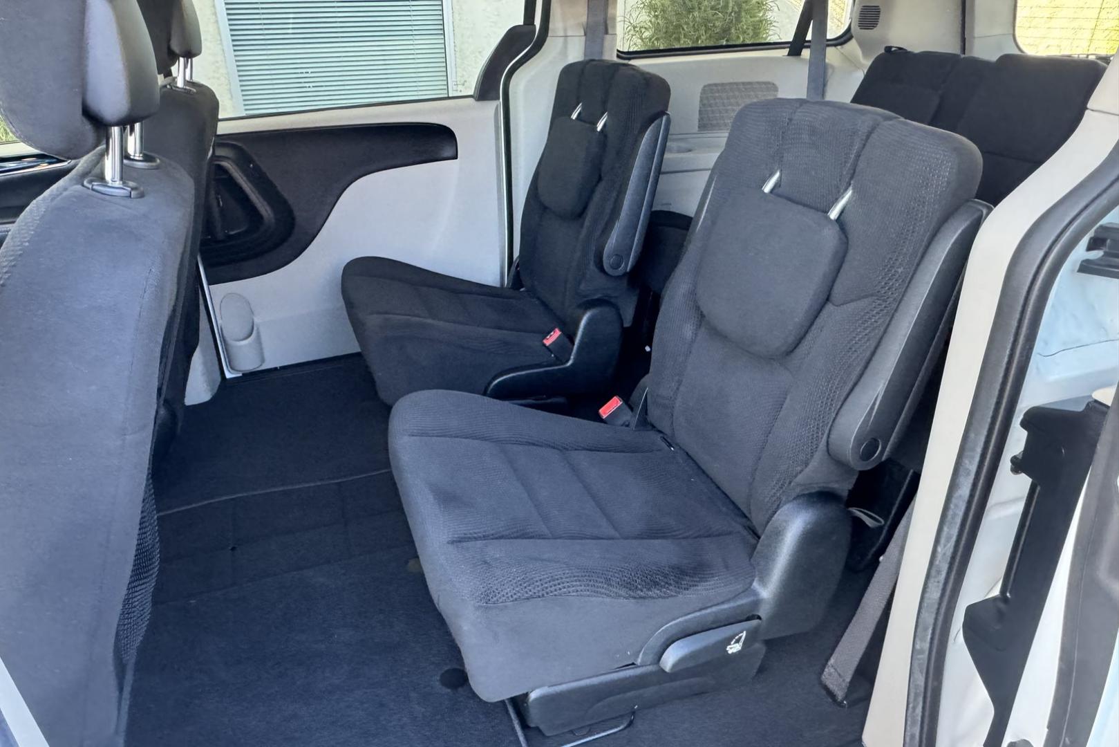2016 White /Black Dodge Grand Caravan SE Plus (2C4RDGBG6GR) with an V6 3.6 Liter engine, Automatic transmission, located at 2304 W. Main St., Boise, ID, 83702, (208) 342-7777, 43.622105, -116.218658 - Stow And Go Seating! 7 Passenger - Photo#6