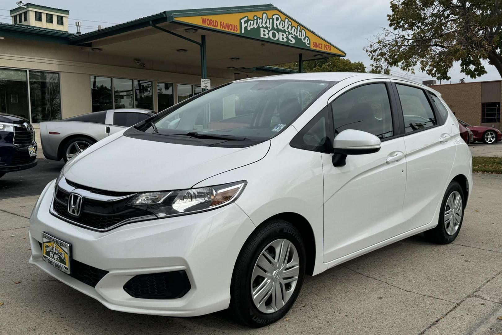 2019 White /Black Honda Fit LX (3HGGK5H49KM) with an 4 Cyl 1.5 Liter engine, Automatic transmission, located at 2304 W. Main St., Boise, ID, 83702, (208) 342-7777, 43.622105, -116.218658 - Great Fuel Economy! Legendary Powertrain! - Photo#0