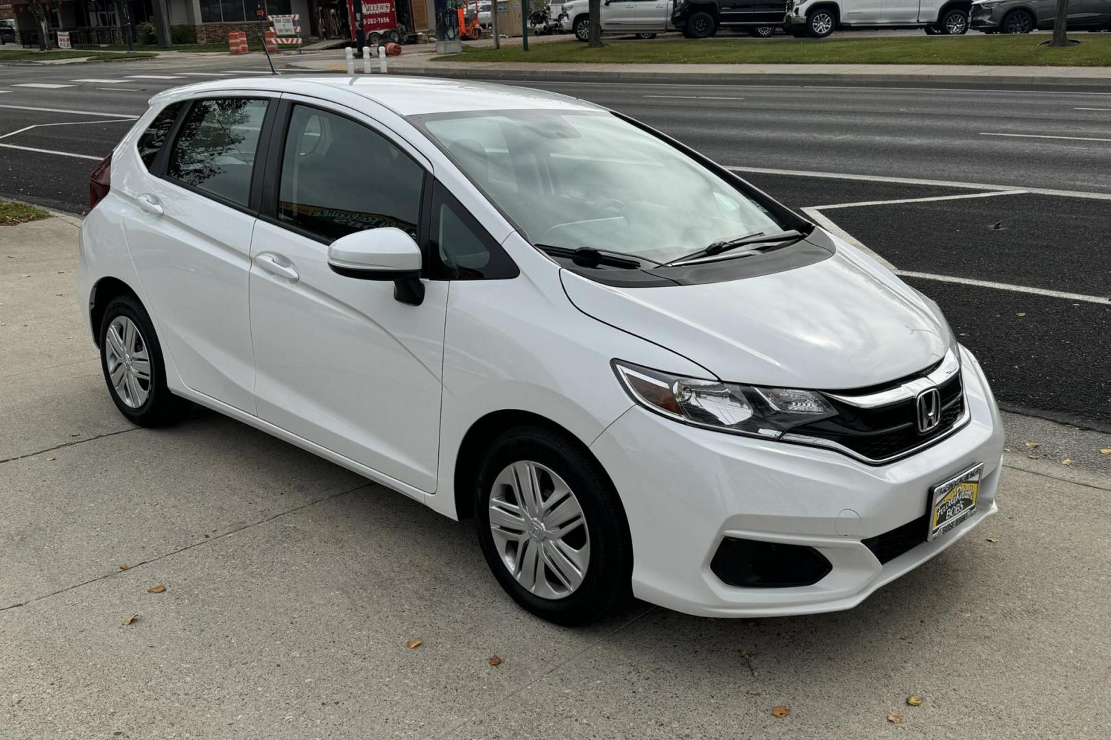2019 White /Black Honda Fit LX (3HGGK5H49KM) with an 4 Cyl 1.5 Liter engine, Automatic transmission, located at 2304 W. Main St., Boise, ID, 83702, (208) 342-7777, 43.622105, -116.218658 - Great Fuel Economy! Legendary Powertrain! - Photo#1