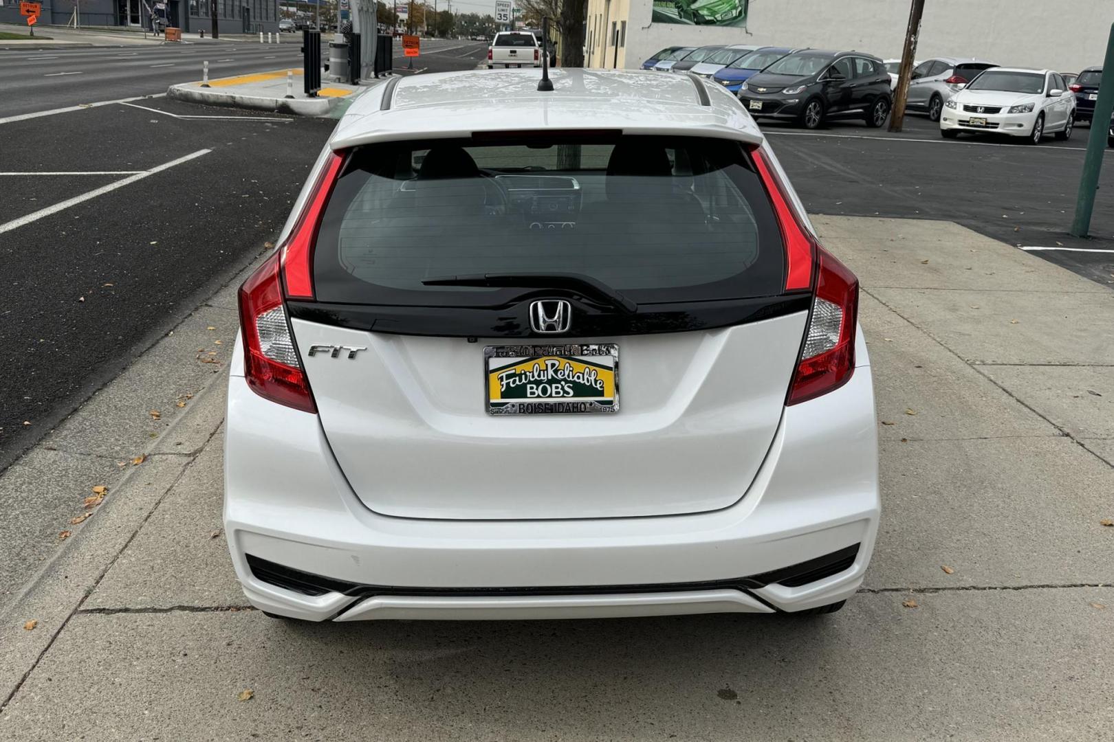 2019 White /Black Honda Fit LX (3HGGK5H49KM) with an 4 Cyl 1.5 Liter engine, Automatic transmission, located at 2304 W. Main St., Boise, ID, 83702, (208) 342-7777, 43.622105, -116.218658 - Great Fuel Economy! Legendary Powertrain! - Photo#2