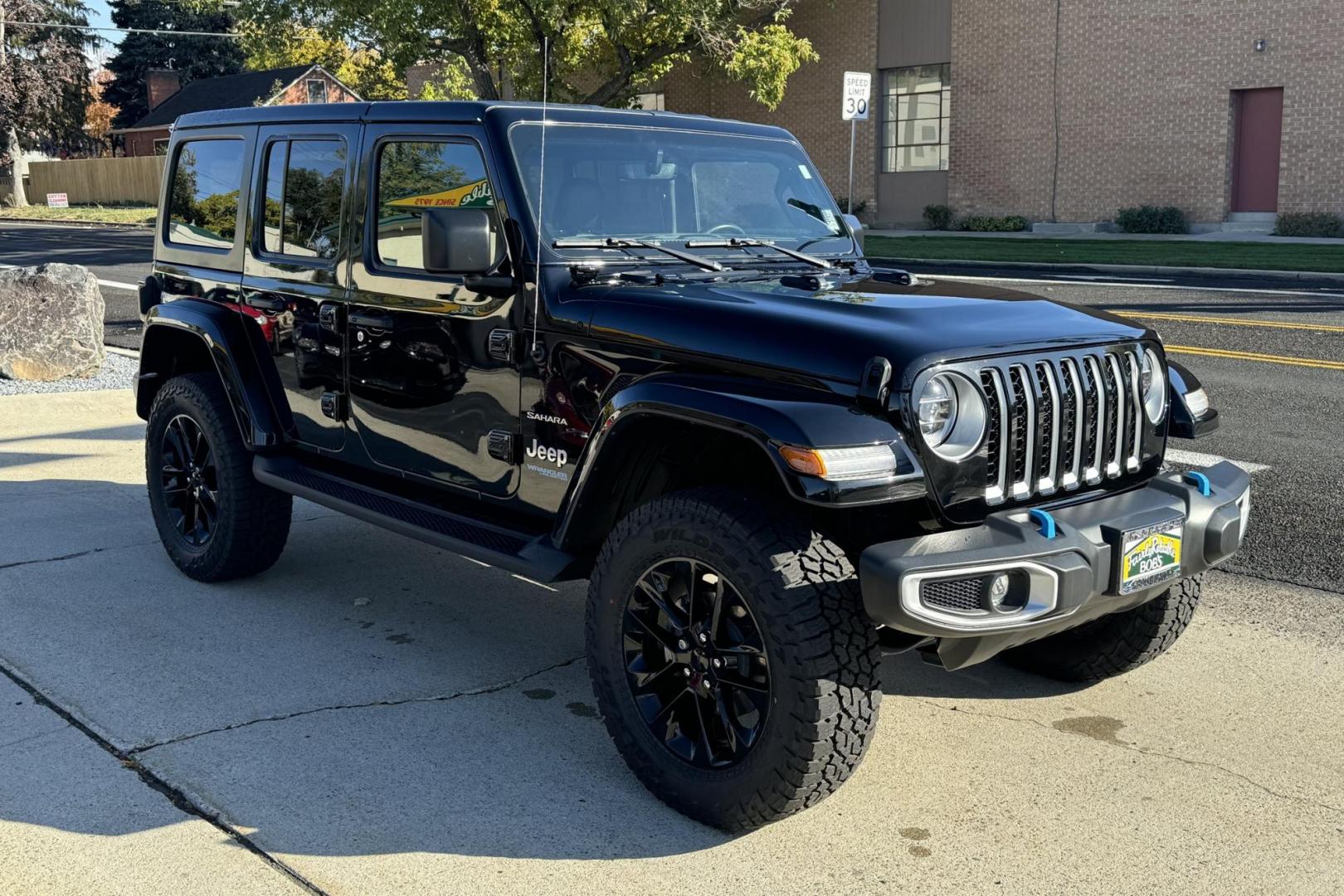2022 Black /Black Jeep Wrangler 4XE Unlimited Sahara (1C4JJXP68NW) , Automatic 8 Speed transmission, located at 2304 W. Main St., Boise, ID, 83702, (208) 342-7777, 43.622105, -116.218658 - Best Of Both Worlds! Great Fuel Economy In Town And Ready For Off-Road Anytime! - Photo#2