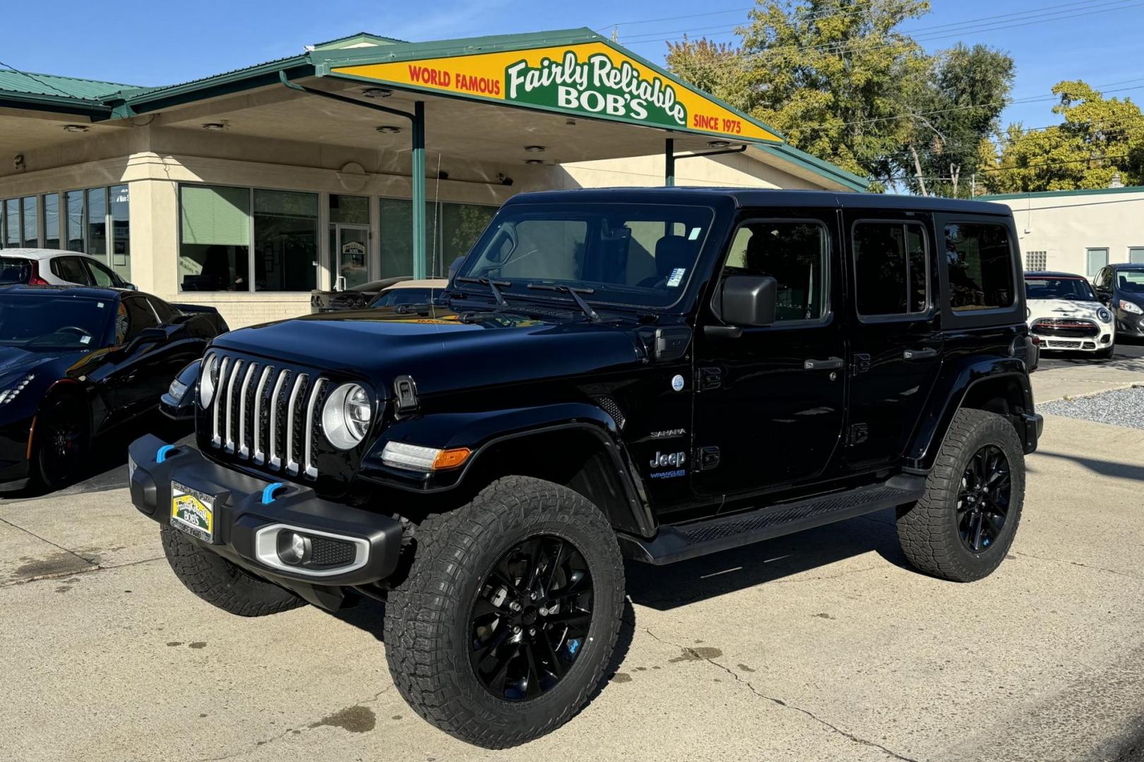 2022 Black /Black Jeep Wrangler 4XE Unlimited Sahara (1C4JJXP68NW) , Automatic 8 Speed transmission, located at 2304 W. Main St., Boise, ID, 83702, (208) 342-7777, 43.622105, -116.218658 - Best Of Both Worlds! Great Fuel Economy In Town And Ready For Off-Road Anytime! - Photo#0