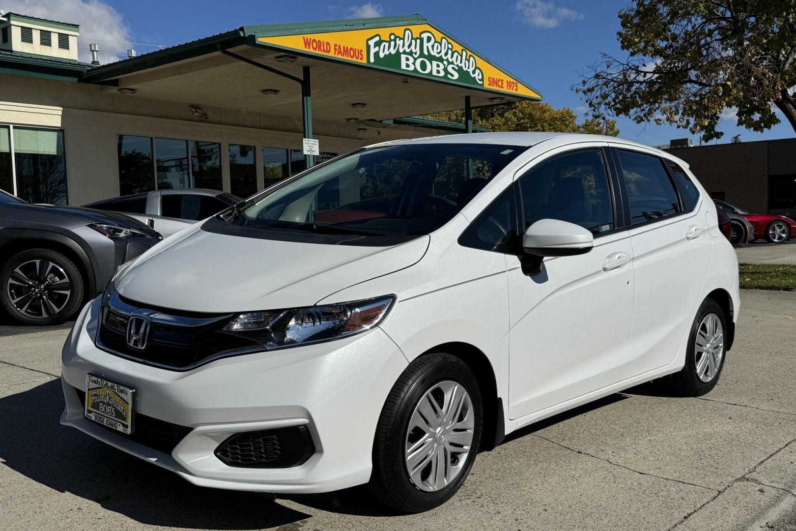 2019 White /Black Honda Fit LX (3HGGK5H4XKM) with an 4 Cyl 1.5 Liter engine, Automatic transmission, located at 2304 W. Main St., Boise, ID, 83702, (208) 342-7777, 43.622105, -116.218658 - Photo#0