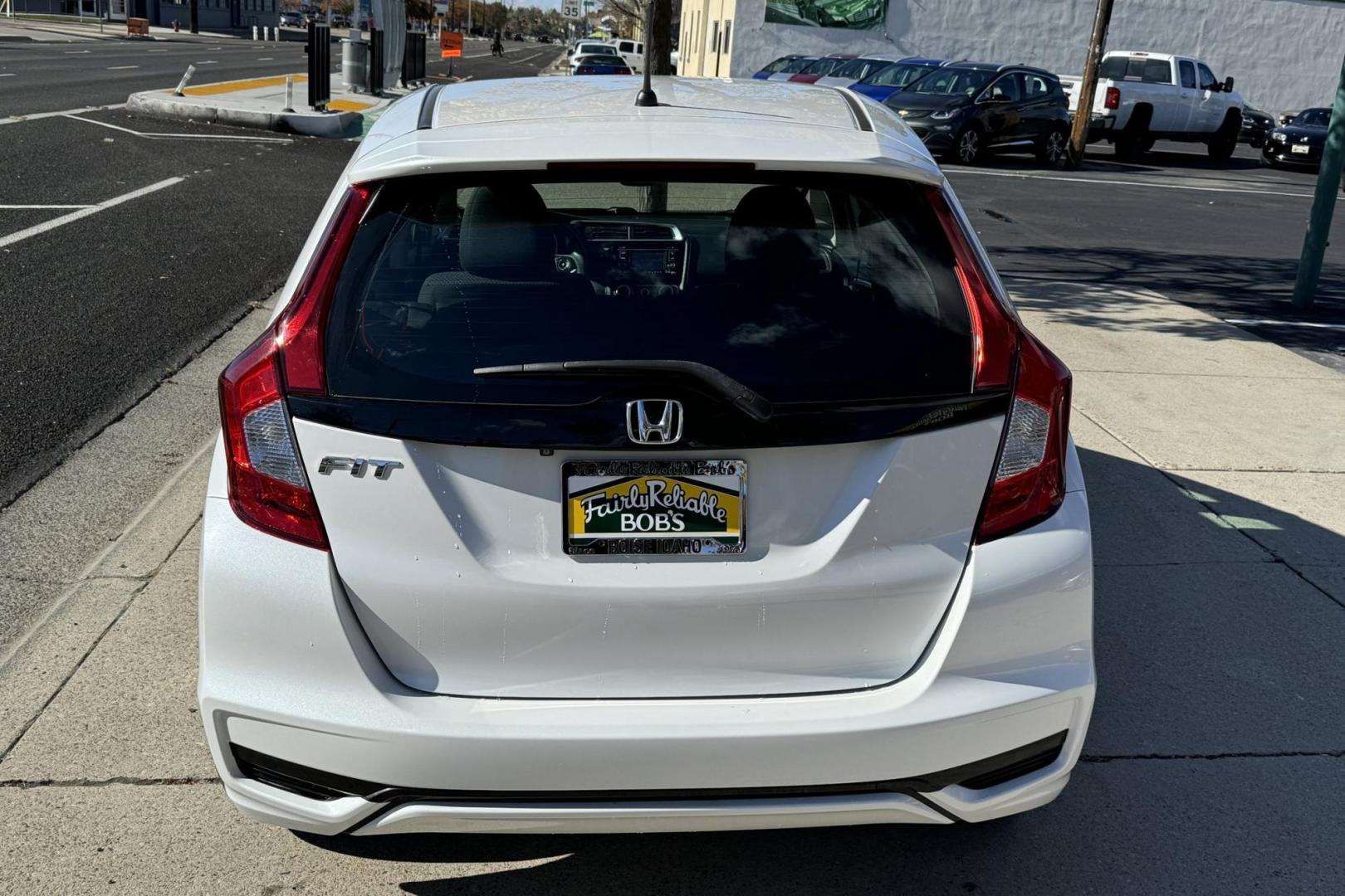 2019 White /Black Honda Fit LX (3HGGK5H4XKM) with an 4 Cyl 1.5 Liter engine, Automatic transmission, located at 2304 W. Main St., Boise, ID, 83702, (208) 342-7777, 43.622105, -116.218658 - Photo#1
