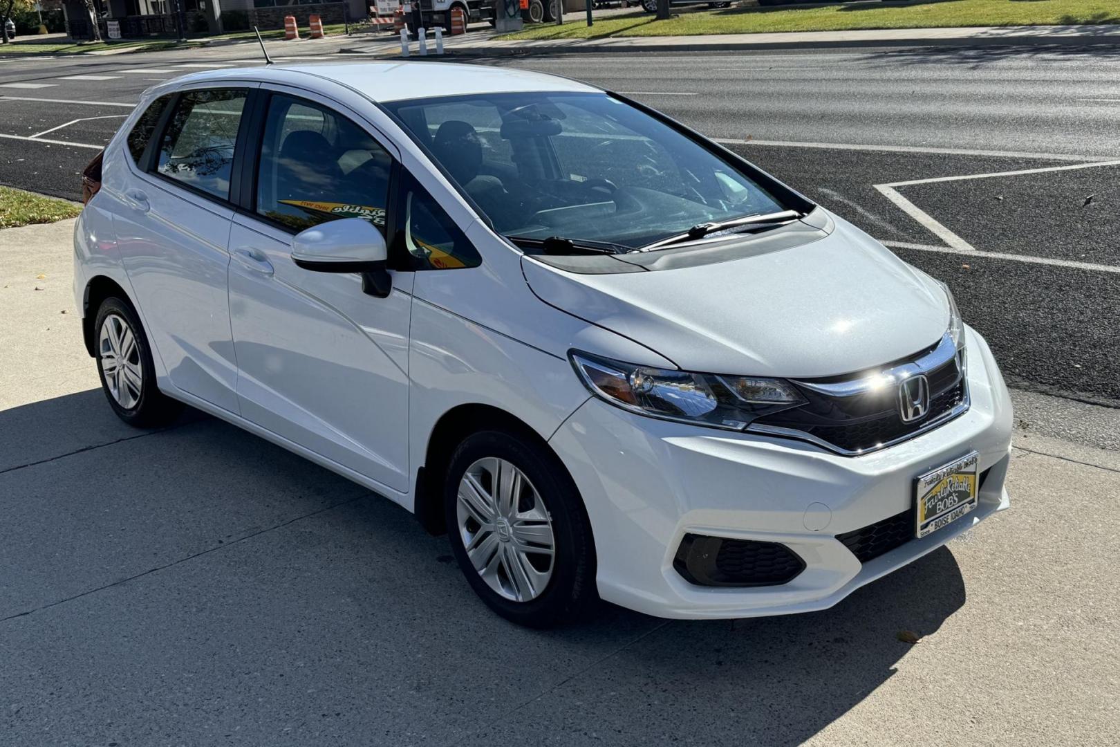 2019 White /Black Honda Fit LX (3HGGK5H4XKM) with an 4 Cyl 1.5 Liter engine, Automatic transmission, located at 2304 W. Main St., Boise, ID, 83702, (208) 342-7777, 43.622105, -116.218658 - Photo#2