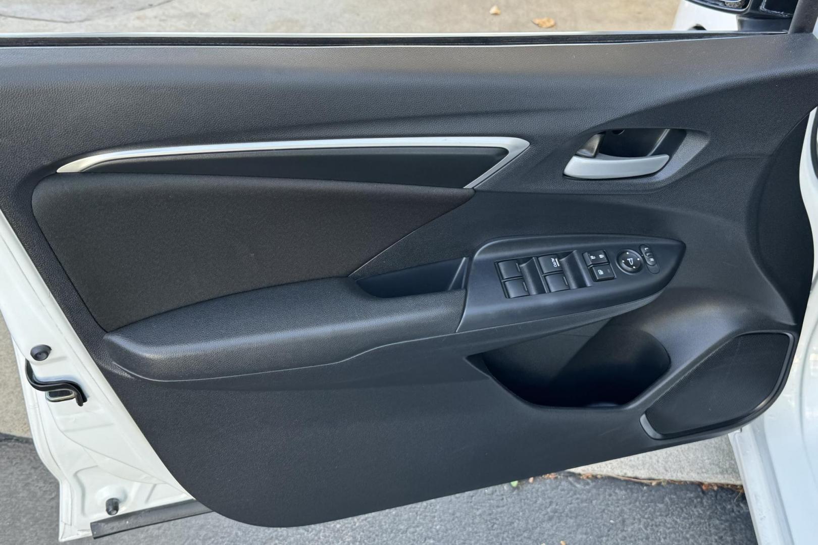 2019 White /Black Honda Fit LX (3HGGK5H4XKM) with an 4 Cyl 1.5 Liter engine, Automatic transmission, located at 2304 W. Main St., Boise, ID, 83702, (208) 342-7777, 43.622105, -116.218658 - Photo#5
