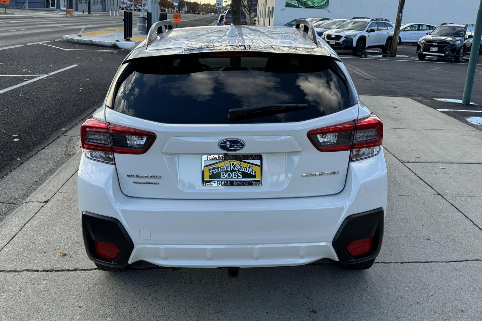 2023 White Diamond Pearl /Black/Gray Subaru Crosstrek Premium (JF2GTAPCXP8) with an H4 2.0 Liter engine, Automatic transmission, located at 2304 W. Main St., Boise, ID, 83702, (208) 342-7777, 43.622105, -116.218658 - Remaining Factory Warranty! Great In The Snow! - Photo#1