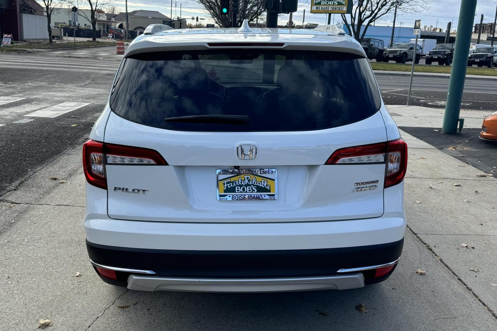 2021 Platinum White Pearl /Black Honda Pilot Touring (5FNYF6H96MB) with an V6 3.5 Liter engine, Automatic 9 Speed transmission, located at 2304 W. Main St., Boise, ID, 83702, (208) 342-7777, 43.622105, -116.218658 - 8 Passenger Seating! New Tires Too! - Photo#3