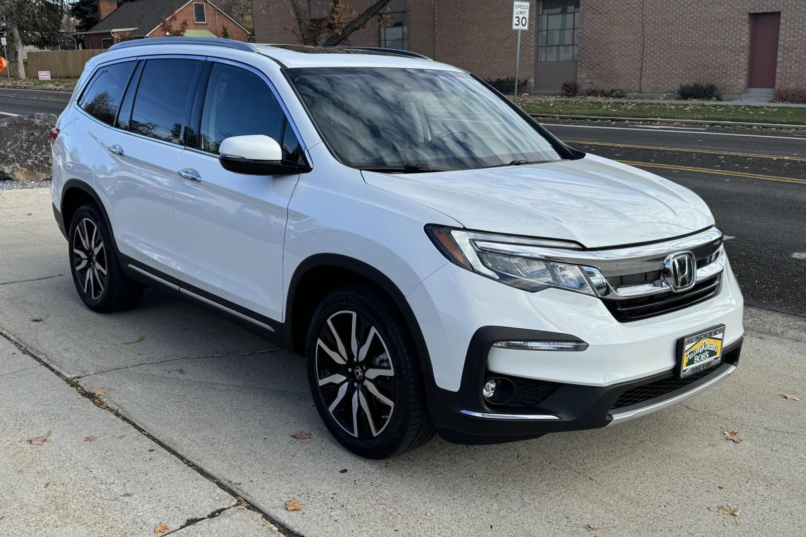 2021 Platinum White Pearl /Black Honda Pilot Touring (5FNYF6H96MB) with an V6 3.5 Liter engine, Automatic 9 Speed transmission, located at 2304 W. Main St., Boise, ID, 83702, (208) 342-7777, 43.622105, -116.218658 - 8 Passenger Seating! New Tires Too! - Photo#2