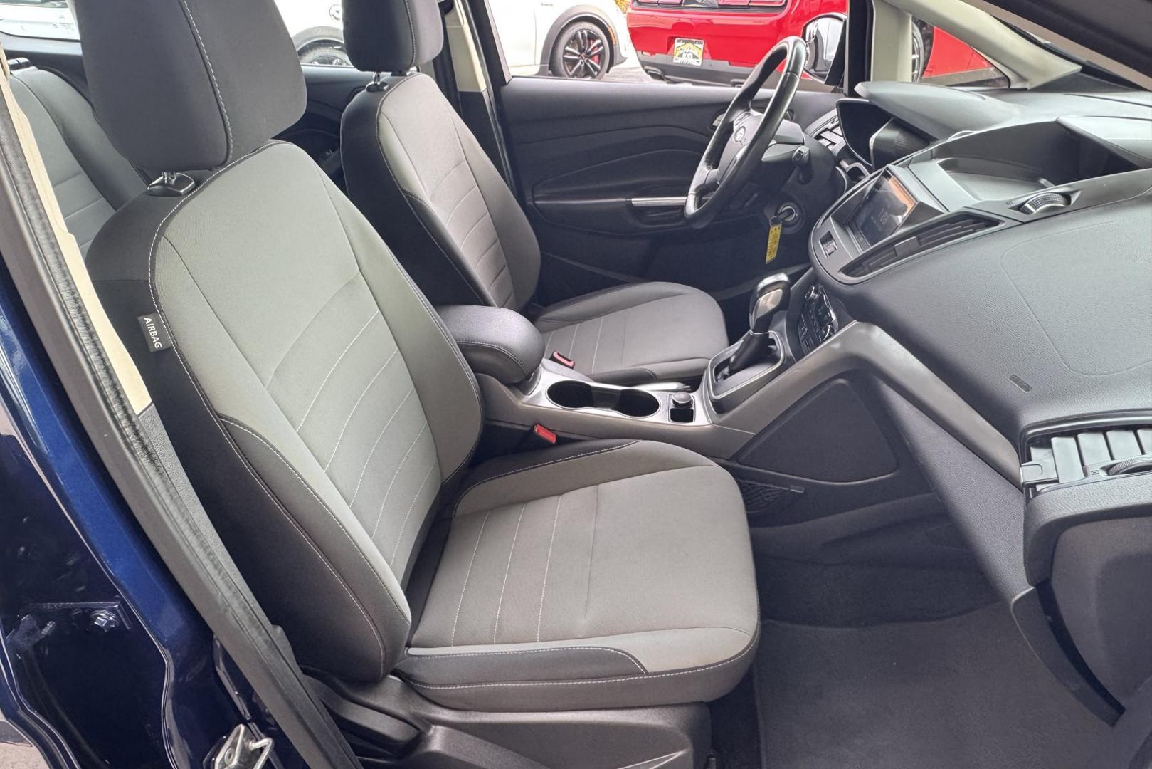 2016 Kona Blue /Gray Ford C-Max Hybrid SE (1FADP5AU5GL) with an 4 Cyl 2.0 Liter Hybrid engine, Automatic transmission, located at 2304 W. Main St., Boise, ID, 83702, (208) 342-7777, 43.622105, -116.218658 - New Tires! Great Fuel Economy! Upgraded To Apple Car Play/Android Auto! - Photo#15