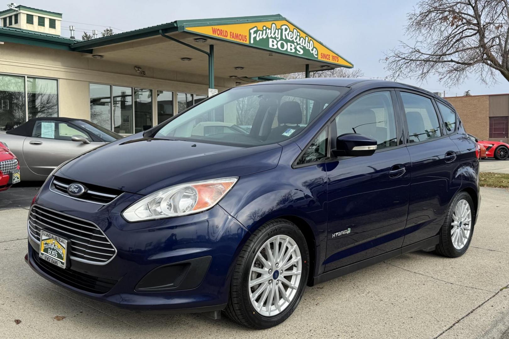 2016 Kona Blue /Gray Ford C-Max Hybrid SE (1FADP5AU5GL) with an 4 Cyl 2.0 Liter Hybrid engine, Automatic transmission, located at 2304 W. Main St., Boise, ID, 83702, (208) 342-7777, 43.622105, -116.218658 - New Tires! Great Fuel Economy! Upgraded To Apple Car Play/Android Auto! - Photo#0
