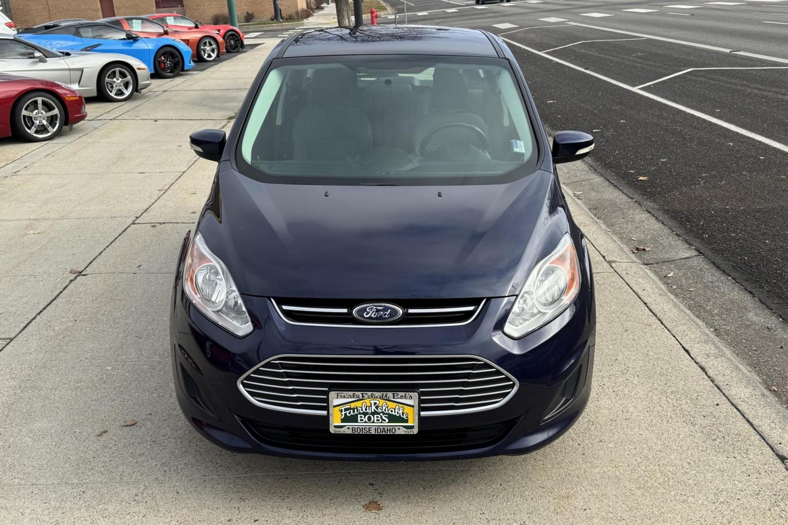 2016 Kona Blue /Gray Ford C-Max Hybrid SE (1FADP5AU5GL) with an 4 Cyl 2.0 Liter Hybrid engine, Automatic transmission, located at 2304 W. Main St., Boise, ID, 83702, (208) 342-7777, 43.622105, -116.218658 - New Tires! Great Fuel Economy! Upgraded To Apple Car Play/Android Auto! - Photo#2