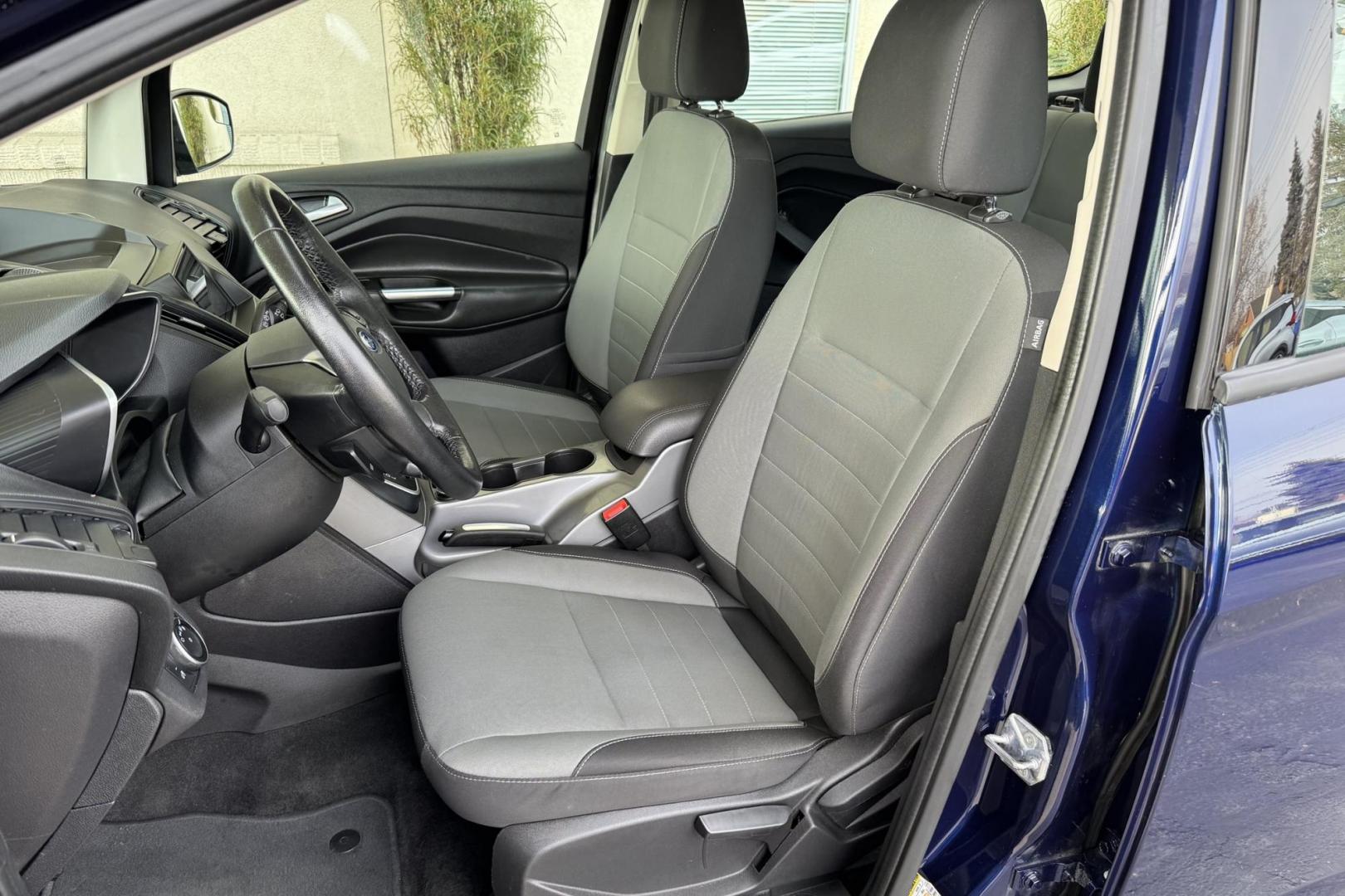 2016 Kona Blue /Gray Ford C-Max Hybrid SE (1FADP5AU5GL) with an 4 Cyl 2.0 Liter Hybrid engine, Automatic transmission, located at 2304 W. Main St., Boise, ID, 83702, (208) 342-7777, 43.622105, -116.218658 - New Tires! Great Fuel Economy! Upgraded To Apple Car Play/Android Auto! - Photo#4