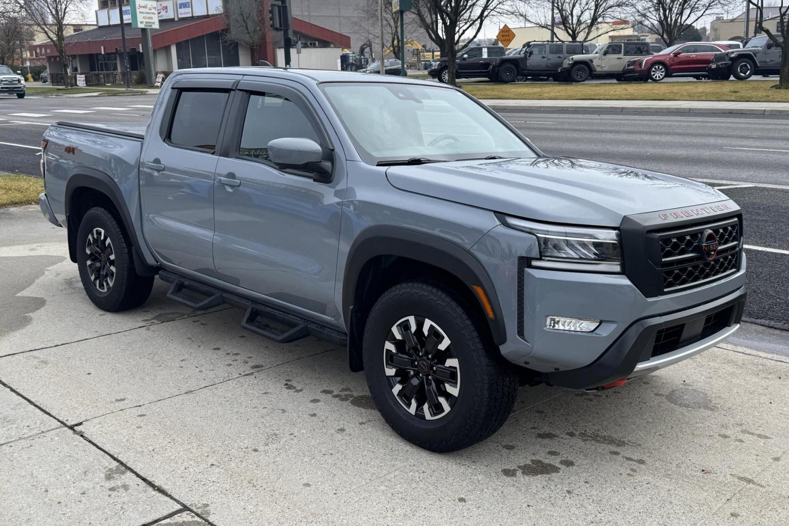 2022 Boulder Gray Pearl /Black Nissan Frontier PRO-4X (1N6ED1EK7NN) with an V6 3.8 Liter engine, Automatic 9 Speed transmission, located at 2304 W. Main St., Boise, ID, 83702, (208) 342-7777, 43.622105, -116.218658 - Photo#2