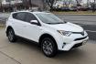 2018 Super White /Black Toyota RAV4 XLE (JTMRJREV1JD) with an 4 Cyl 2.5 Liter Hybrid engine, Automatic transmission, located at 2304 W. Main St., Boise, ID, 83702, (208) 342-7777, 43.622105, -116.218658 - Hard To Find! Great To Own! - Photo#2