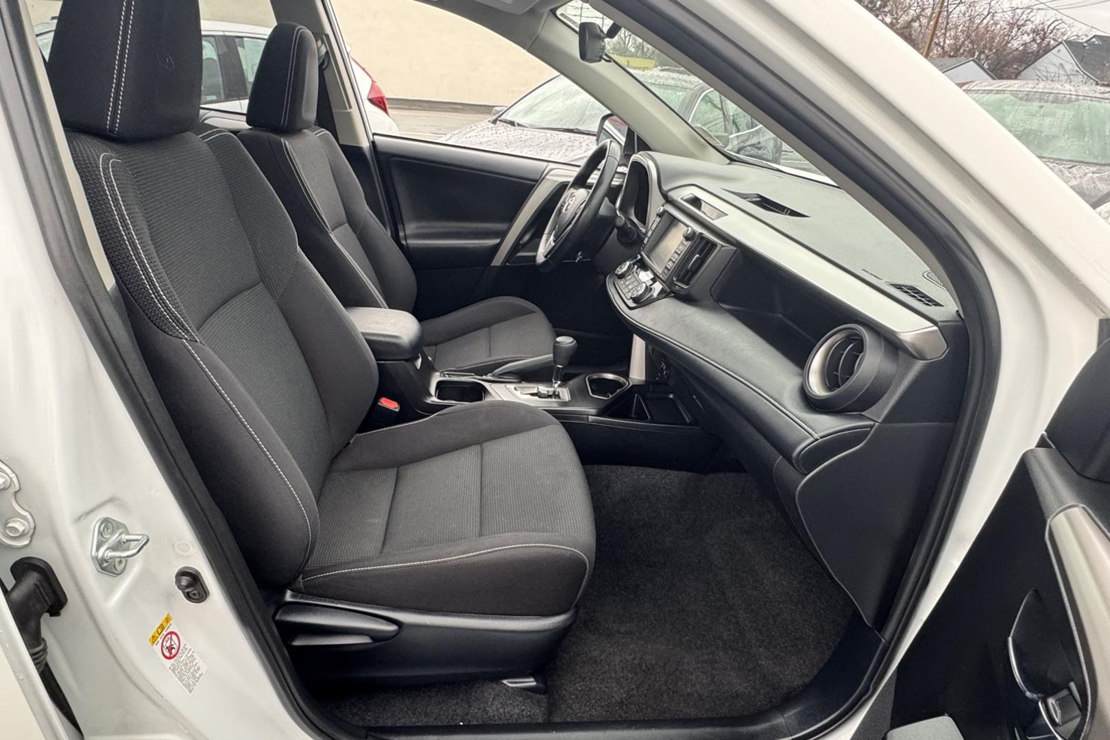 2018 Super White /Black Toyota RAV4 XLE (JTMRJREV1JD) with an 4 Cyl 2.5 Liter Hybrid engine, Automatic transmission, located at 2304 W. Main St., Boise, ID, 83702, (208) 342-7777, 43.622105, -116.218658 - Hard To Find! Great To Own! - Photo#17