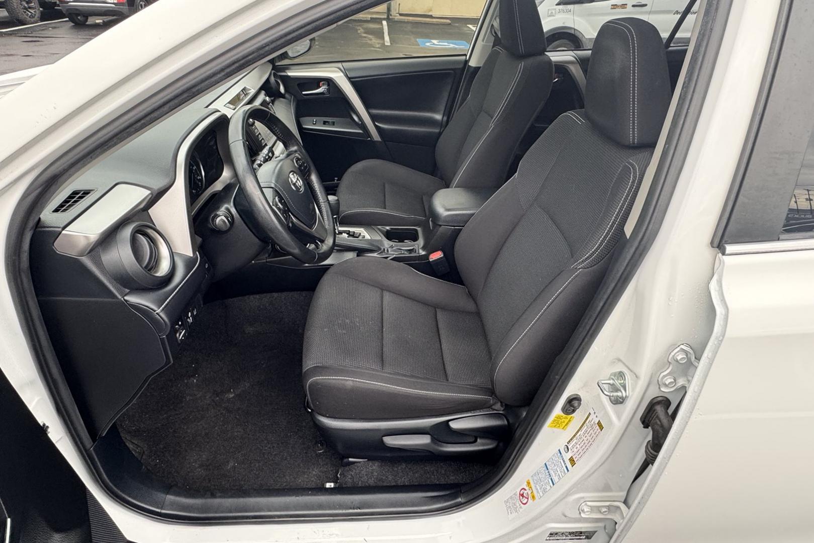 2018 Super White /Black Toyota RAV4 XLE (JTMRJREV1JD) with an 4 Cyl 2.5 Liter Hybrid engine, Automatic transmission, located at 2304 W. Main St., Boise, ID, 83702, (208) 342-7777, 43.622105, -116.218658 - Hard To Find! Great To Own! - Photo#9