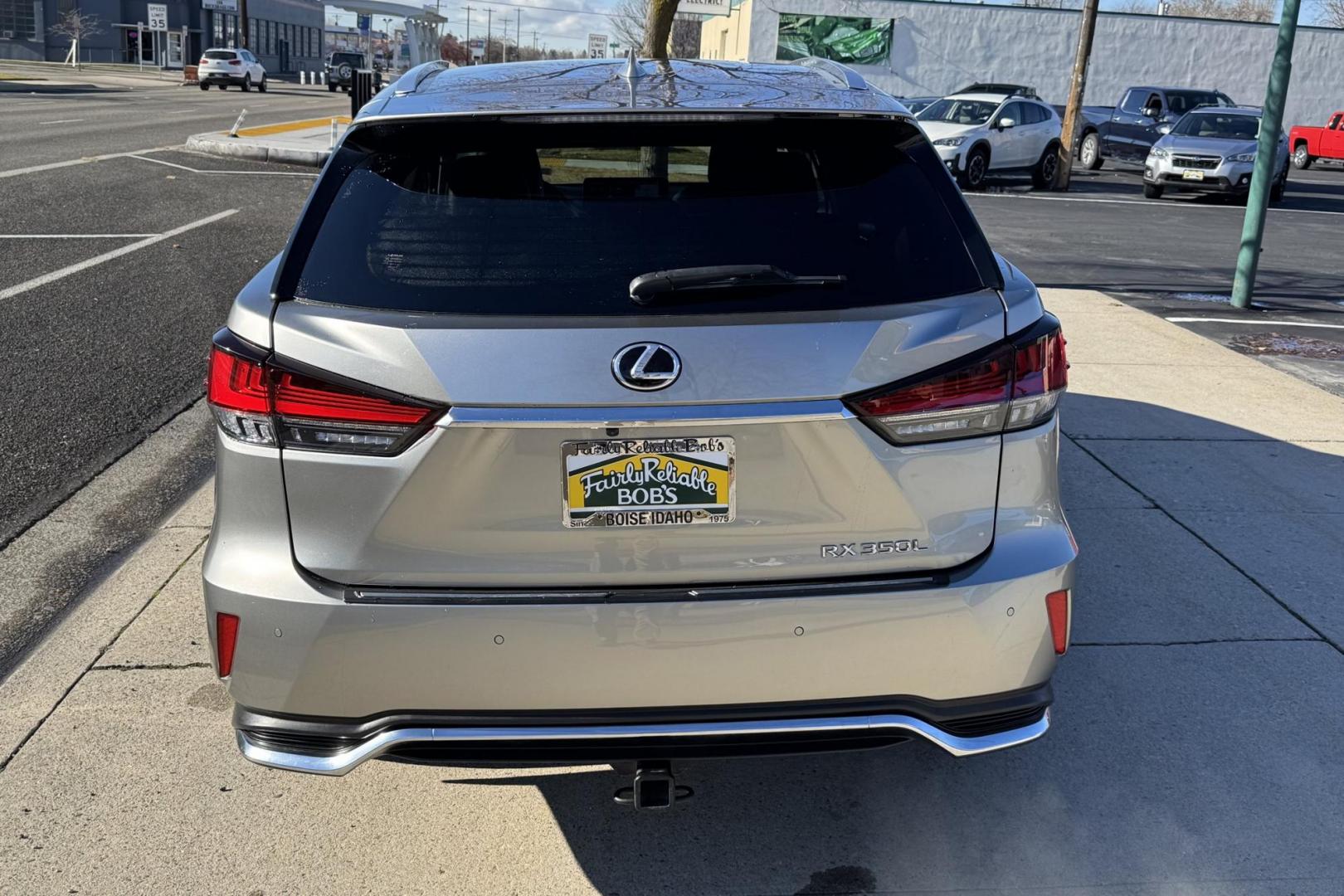 2021 Atomic Silver /Black Lexus RX 350L Luxury (JTJJZKFAXM2) with an V6 3.5 Liter engine, Automatic 8 Speed transmission, located at 2304 W. Main St., Boise, ID, 83702, (208) 342-7777, 43.622105, -116.218658 - Photo#3