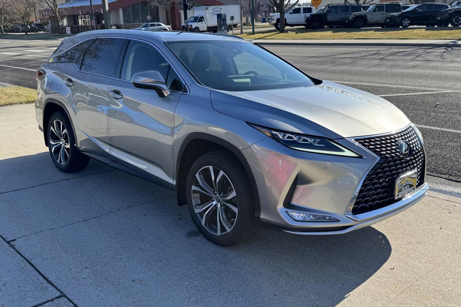 2021 Atomic Silver /Black Lexus RX 350L Luxury (JTJJZKFAXM2) with an V6 3.5 Liter engine, Automatic 8 Speed transmission, located at 2304 W. Main St., Boise, ID, 83702, (208) 342-7777, 43.622105, -116.218658 - Photo#2