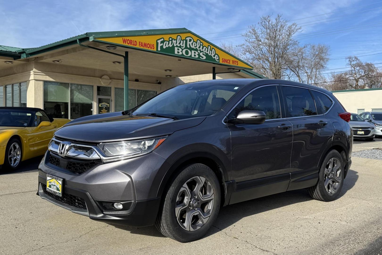 2018 Modern Steel Metallic /Light Gray Honda CR-V EX-L (7FARW1H82JE) with an 4 Cyl 1.5 Liter Turbo engine, Automatic transmission, located at 2304 W. Main St., Boise, ID, 83702, (208) 342-7777, 43.622105, -116.218658 - Clean And Well Optioned! - Photo#0