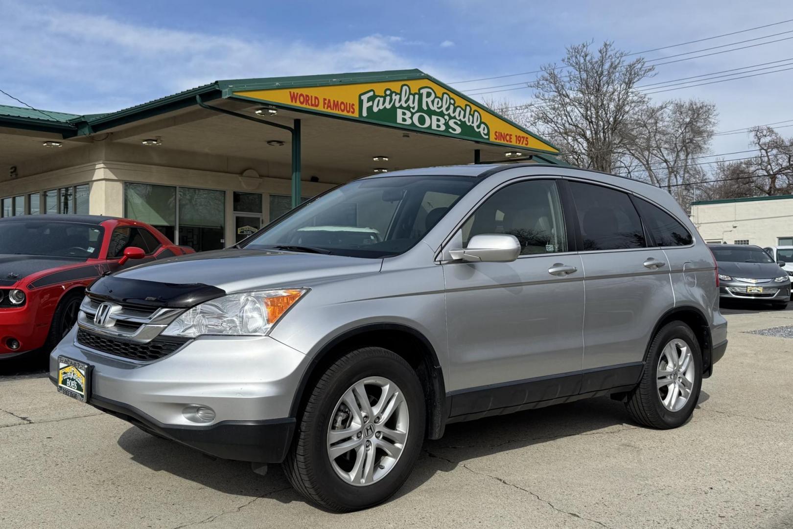 2011 Silver /Gray Honda CR-V EX-L (JHLRE4H78BC) with an 4 Cyl 2.4 Liter engine, Automatic transmission, located at 2304 W. Main St., Boise, ID, 83702, (208) 342-7777, 43.622105, -116.218658 - Hard To Find! Great To Own! - Photo#0