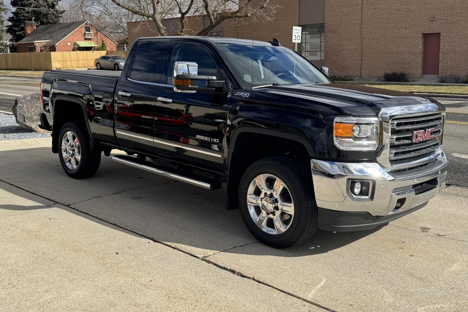 2018 Black /Black GMC Sierra 2500HD SLT (1GT22TEGXJZ) with an V8 6.0 Liter engine, Automatic 6 Speed transmission, located at 2304 W. Main St., Boise, ID, 83702, (208) 342-7777, 43.622105, -116.218658 - Photo#2
