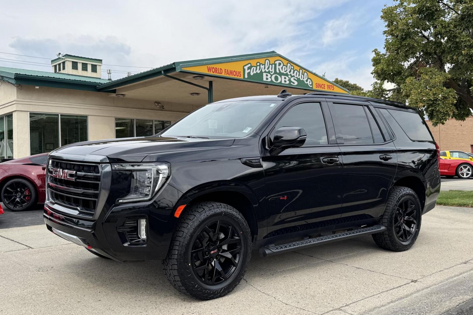 2022 Black /Jet Black/Umber GMC Yukon AT4 (1GKS2CKL9NR) with an V8 6.2 Liter engine, Automatic 10 Speed transmission, located at 2304 W. Main St., Boise, ID, 83702, (208) 342-7777, 43.622105, -116.218658 - Nicely Optioned! - Photo#0