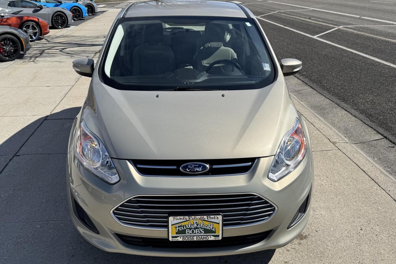 2015 Tectonic Silver Metallic /Medium Stone Ford C-Max Hybrid SE (1FADP5AU5FL) with an 4 Cyl 2.0 Liter Hybrid engine, Automatic transmission, located at 2304 W. Main St., Boise, ID, 83702, (208) 342-7777, 43.622105, -116.218658 - Low Mileage! New Tires Too! - Photo#4