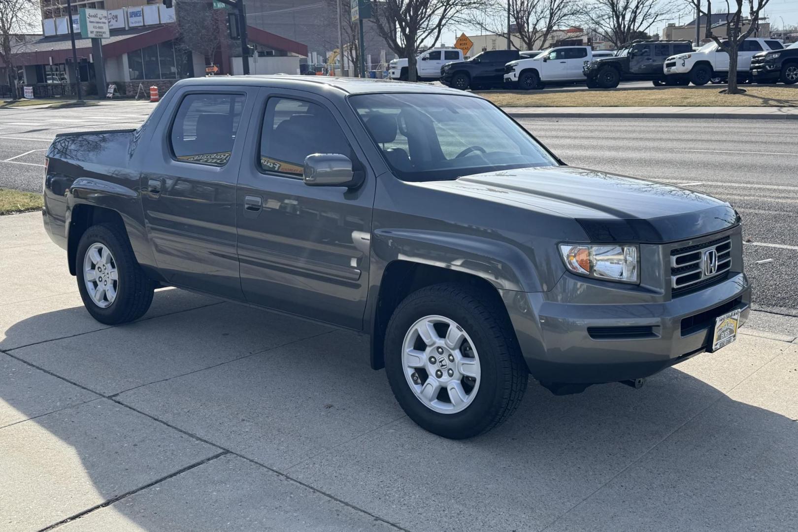 2007 Nimbus Gray /Gray Honda Ridgeline RTL (2HJYK16527H) with an V6 3.5 Liter engine, Automatic transmission, located at 2304 W. Main St., Boise, ID, 83702, (208) 342-7777, 43.622105, -116.218658 - One Owner Idaho Ridgeline! Amazing Condition! - Photo#2