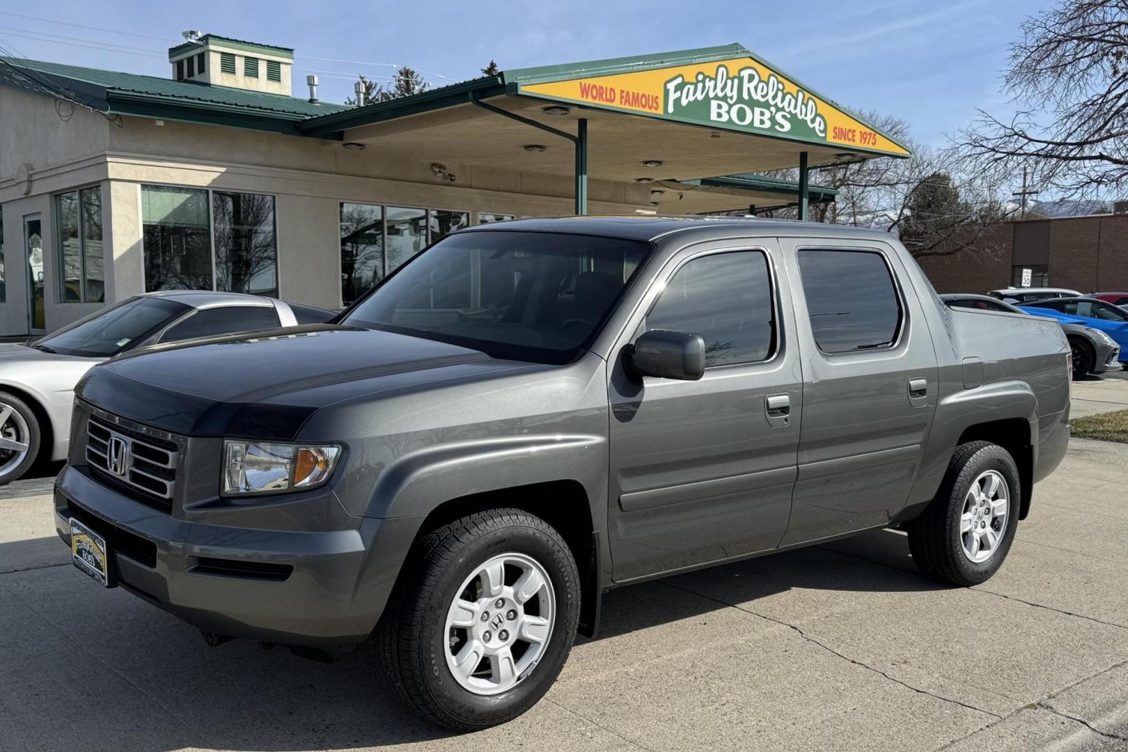 2007 Nimbus Gray /Gray Honda Ridgeline RTL (2HJYK16527H) with an V6 3.5 Liter engine, Automatic transmission, located at 2304 W. Main St., Boise, ID, 83702, (208) 342-7777, 43.622105, -116.218658 - One Owner Idaho Ridgeline! Amazing Condition! - Photo#0