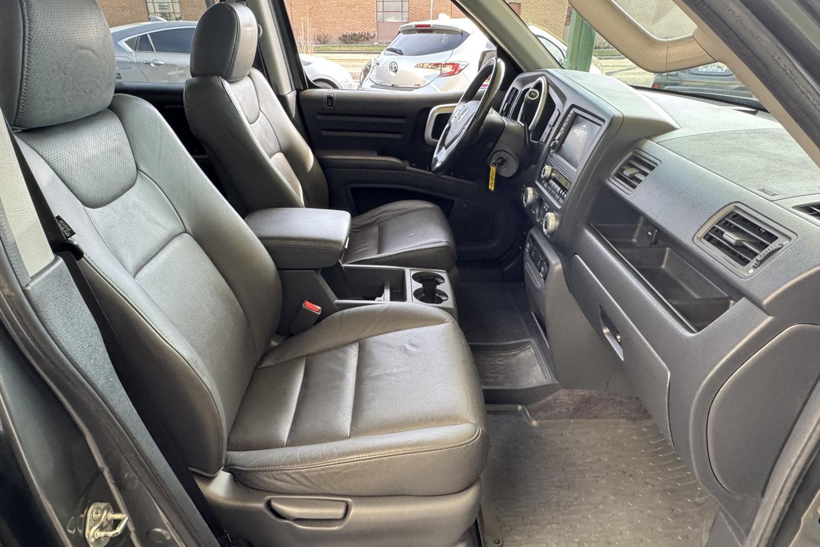 2007 Nimbus Gray /Gray Honda Ridgeline RTL (2HJYK16527H) with an V6 3.5 Liter engine, Automatic transmission, located at 2304 W. Main St., Boise, ID, 83702, (208) 342-7777, 43.622105, -116.218658 - One Owner Idaho Ridgeline! Amazing Condition! - Photo#17