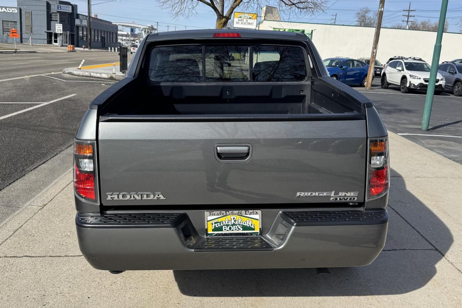 2007 Nimbus Gray /Gray Honda Ridgeline RTL (2HJYK16527H) with an V6 3.5 Liter engine, Automatic transmission, located at 2304 W. Main St., Boise, ID, 83702, (208) 342-7777, 43.622105, -116.218658 - One Owner Idaho Ridgeline! Amazing Condition! - Photo#1