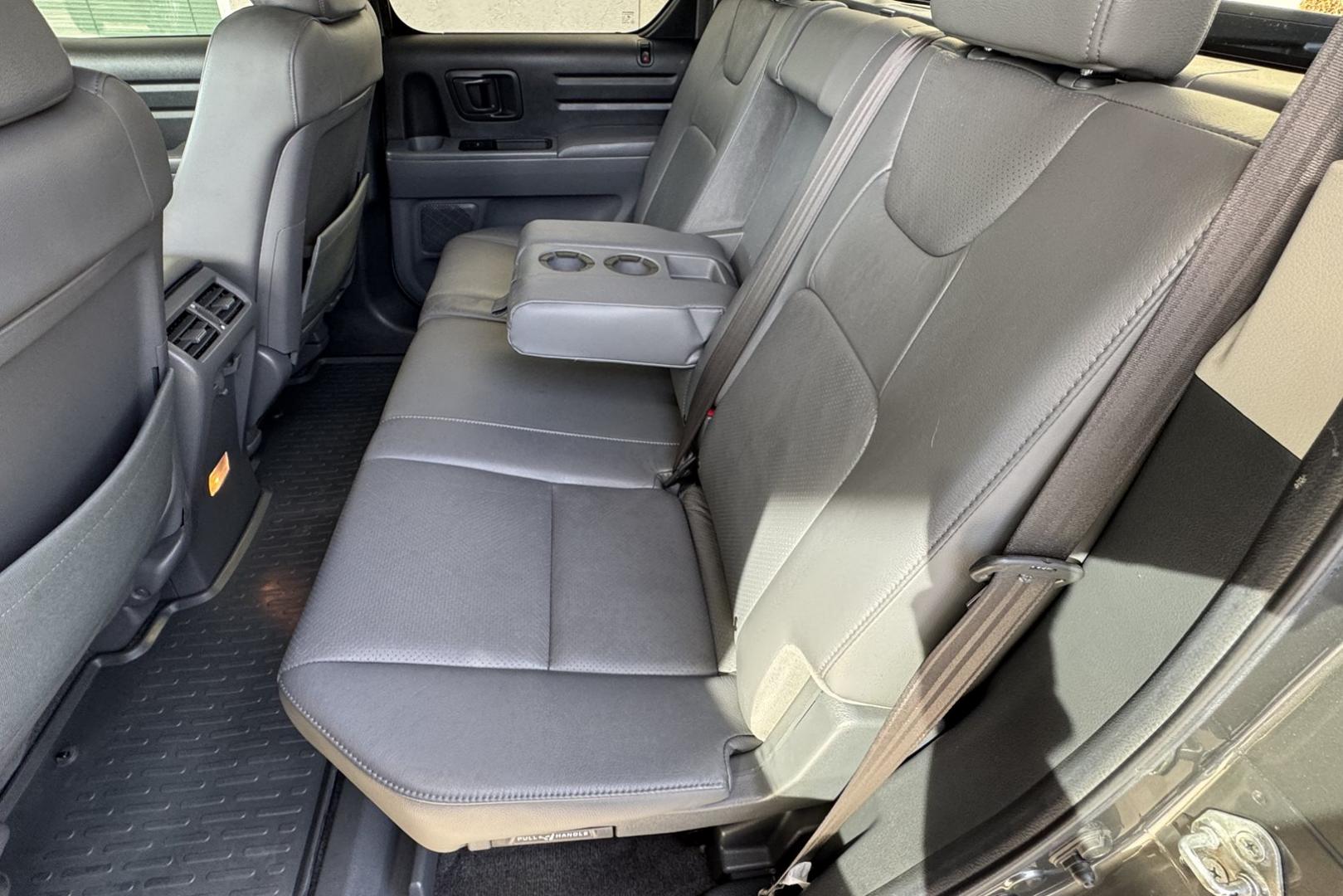 2007 Nimbus Gray /Gray Honda Ridgeline RTL (2HJYK16527H) with an V6 3.5 Liter engine, Automatic transmission, located at 2304 W. Main St., Boise, ID, 83702, (208) 342-7777, 43.622105, -116.218658 - One Owner Idaho Ridgeline! Amazing Condition! - Photo#7