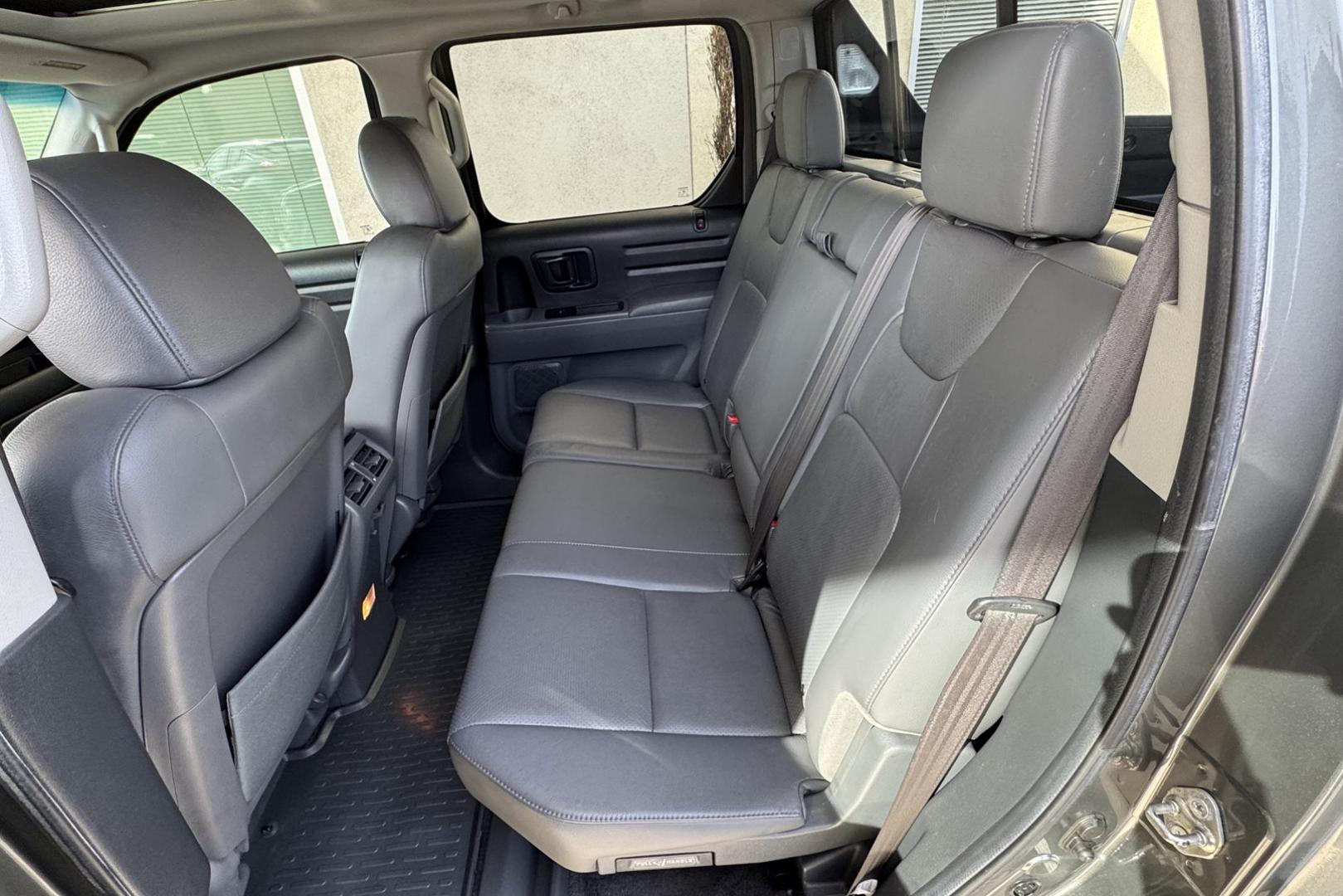 2007 Nimbus Gray /Gray Honda Ridgeline RTL (2HJYK16527H) with an V6 3.5 Liter engine, Automatic transmission, located at 2304 W. Main St., Boise, ID, 83702, (208) 342-7777, 43.622105, -116.218658 - One Owner Idaho Ridgeline! Amazing Condition! - Photo#8
