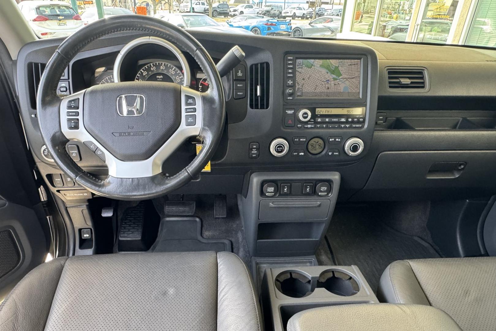 2007 Nimbus Gray /Gray Honda Ridgeline RTL (2HJYK16527H) with an V6 3.5 Liter engine, Automatic transmission, located at 2304 W. Main St., Boise, ID, 83702, (208) 342-7777, 43.622105, -116.218658 - One Owner Idaho Ridgeline! Amazing Condition! - Photo#9