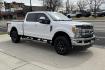 2017 Oxford White /Black Ford F-250 Lariat (1FT7W2B68HE) with an V8 6.2 Liter engine, Automatic 6 Speed transmission, located at 2304 W. Main St., Boise, ID, 83702, (208) 342-7777, 43.622105, -116.218658 - Photo#1