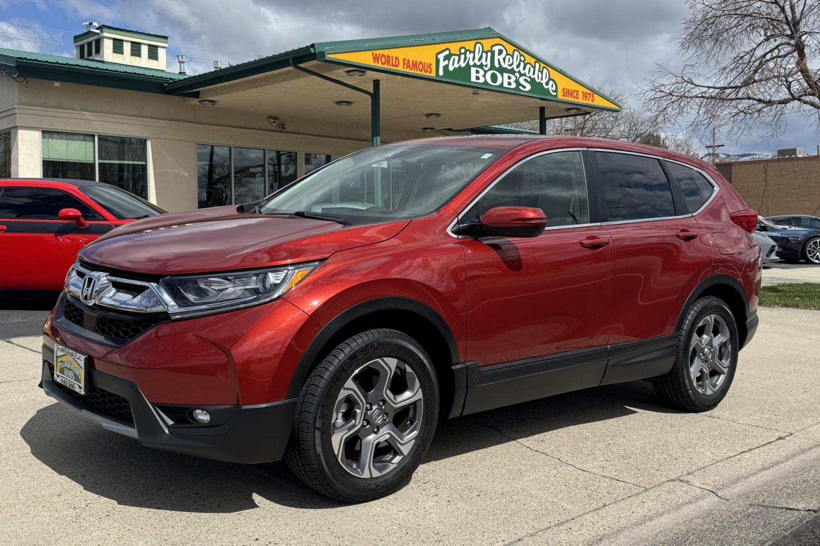 2018 Passion Red Pearl /Oak Honda CR-V EX-L (2HKRW2H87JH) with an 4 Cyl 1.5 Liter Turbo engine, Automatic transmission, located at 2304 W. Main St., Boise, ID, 83702, (208) 342-7777, 43.622105, -116.218658 - Stunning One Owner Idaho SUV! - Photo#0