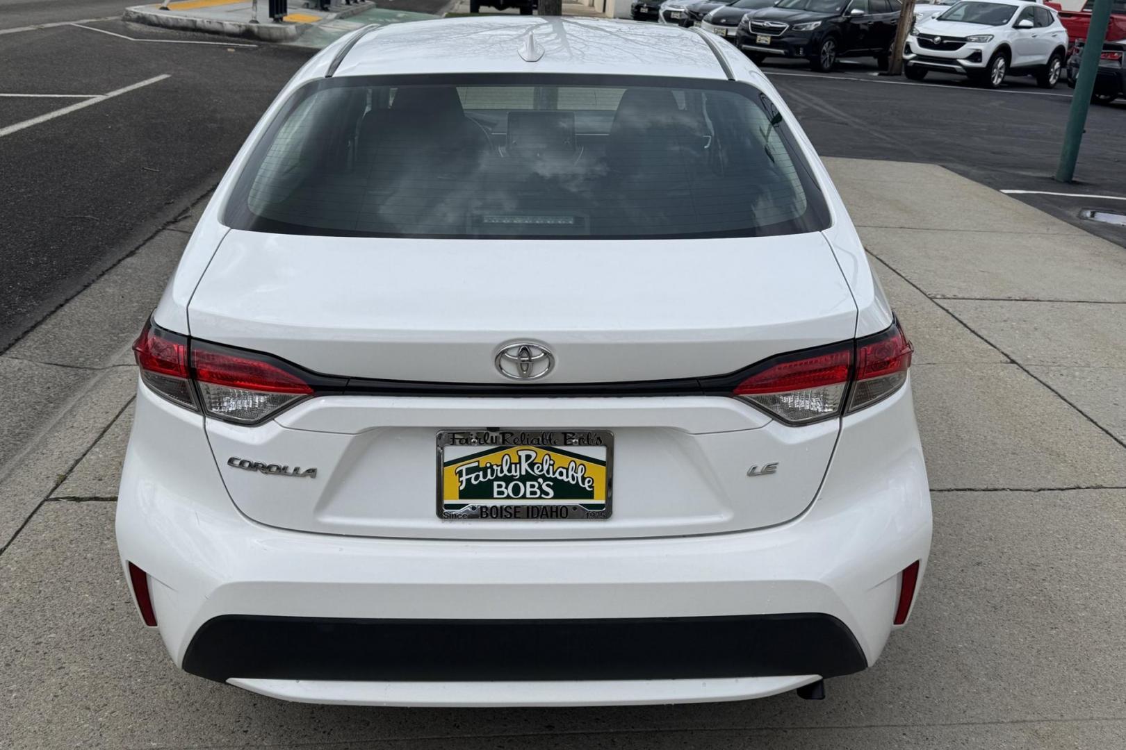 2021 Super White /Black Toyota Corolla LE (5YFEPMAE7MP) with an 4 Cyl 1.8 Liter engine, Automatic transmission, located at 2304 W. Main St., Boise, ID, 83702, (208) 342-7777, 43.622105, -116.218658 - Great Fuel Economy! - Photo#1