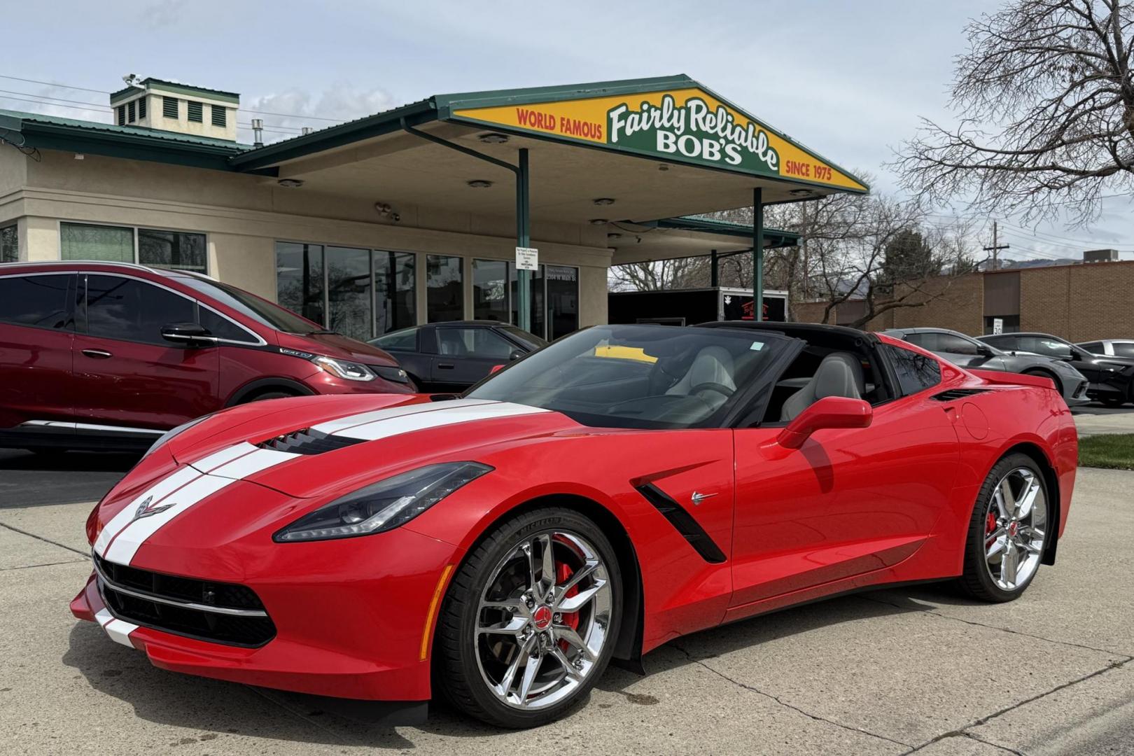 2016 Victory Red /Gray Chevrolet Corvette Stingray 2LT (1G1YD2D77G5) with an V8 6.2 Liter engine, Automatic 8 Speed transmission, located at 2304 W. Main St., Boise, ID, 83702, (208) 342-7777, 43.622105, -116.218658 - Well Cared For And It Shows! - Photo#0