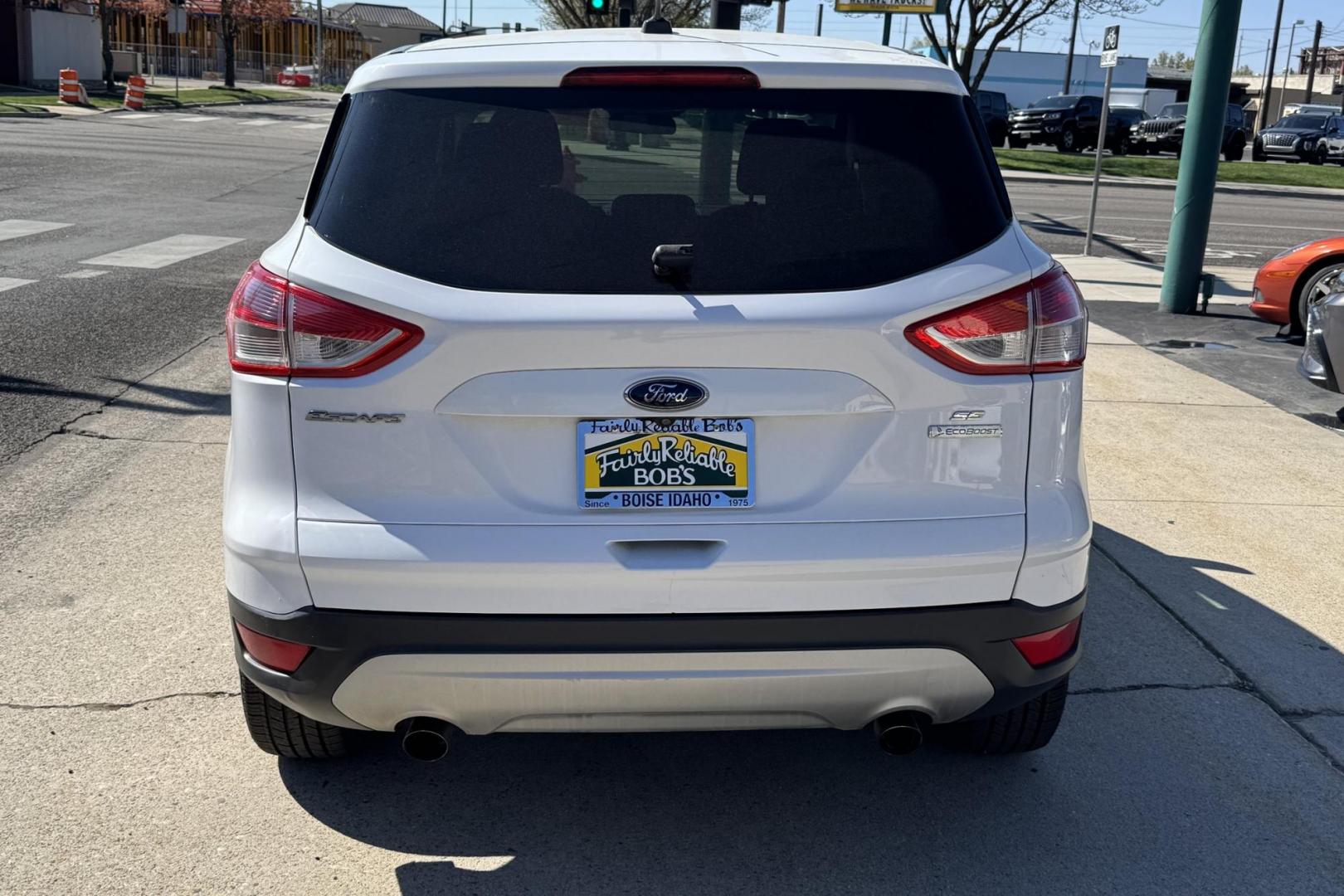 2016 Oxford White /Gray Ford Escape SE (1FMCU0G9XGU) with an 4 Cyl 2.0 Liter Turbo engine, Automatic 6 Speed transmission, located at 2304 W. Main St., Boise, ID, 83702, (208) 342-7777, 43.622105, -116.218658 - New Tires! Great Fuel Economy! Ready To Go! - Photo#2