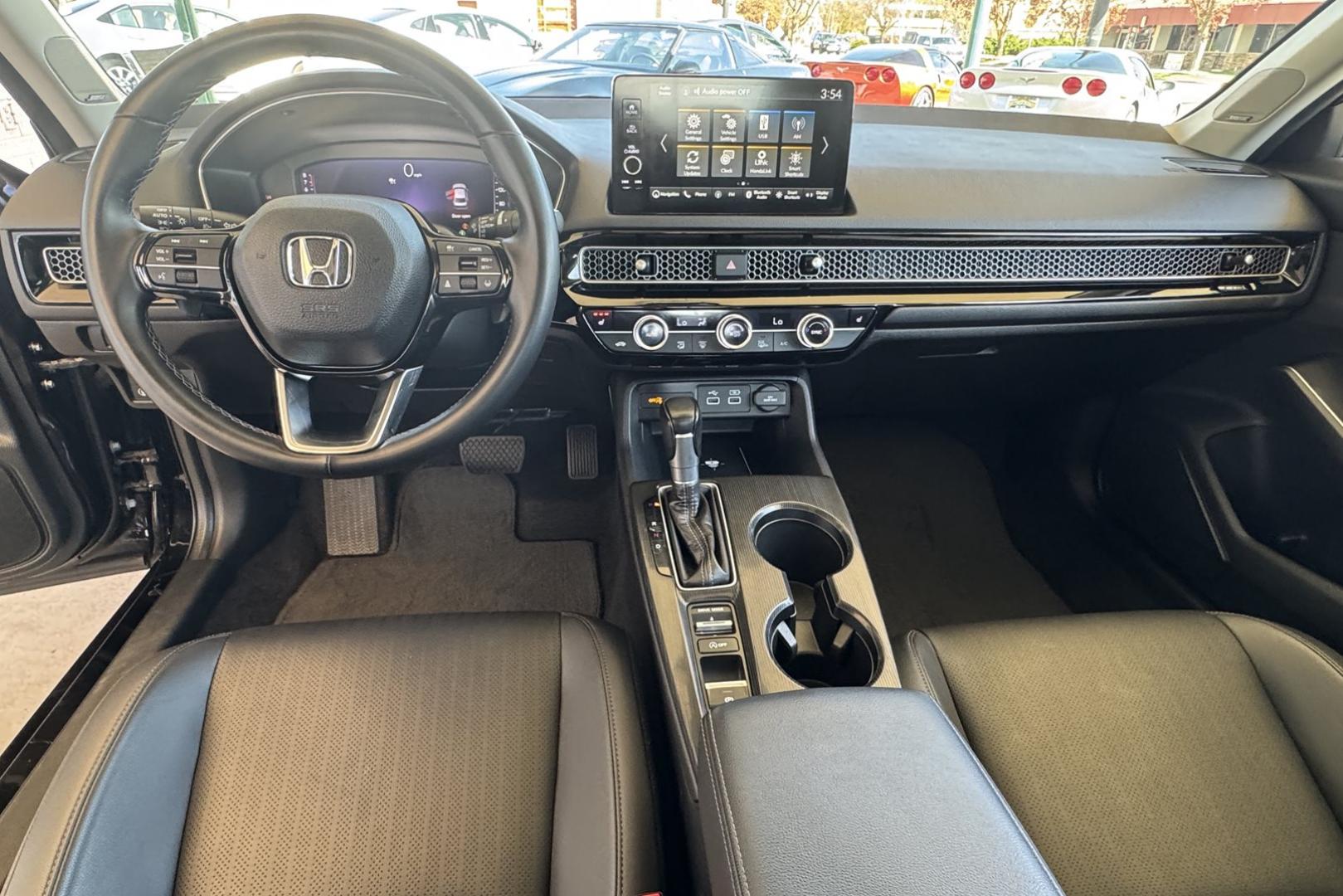2022 Crystal Black Pearl /Black Honda Civic Touring (2HGFE1F95NH) with an 4 Cyl 1.5 Liter Turbo engine, Automatic transmission, located at 2304 W. Main St., Boise, ID, 83702, (208) 342-7777, 43.622105, -116.218658 - Remaining Factory Warranty! Great Cars! - Photo#17