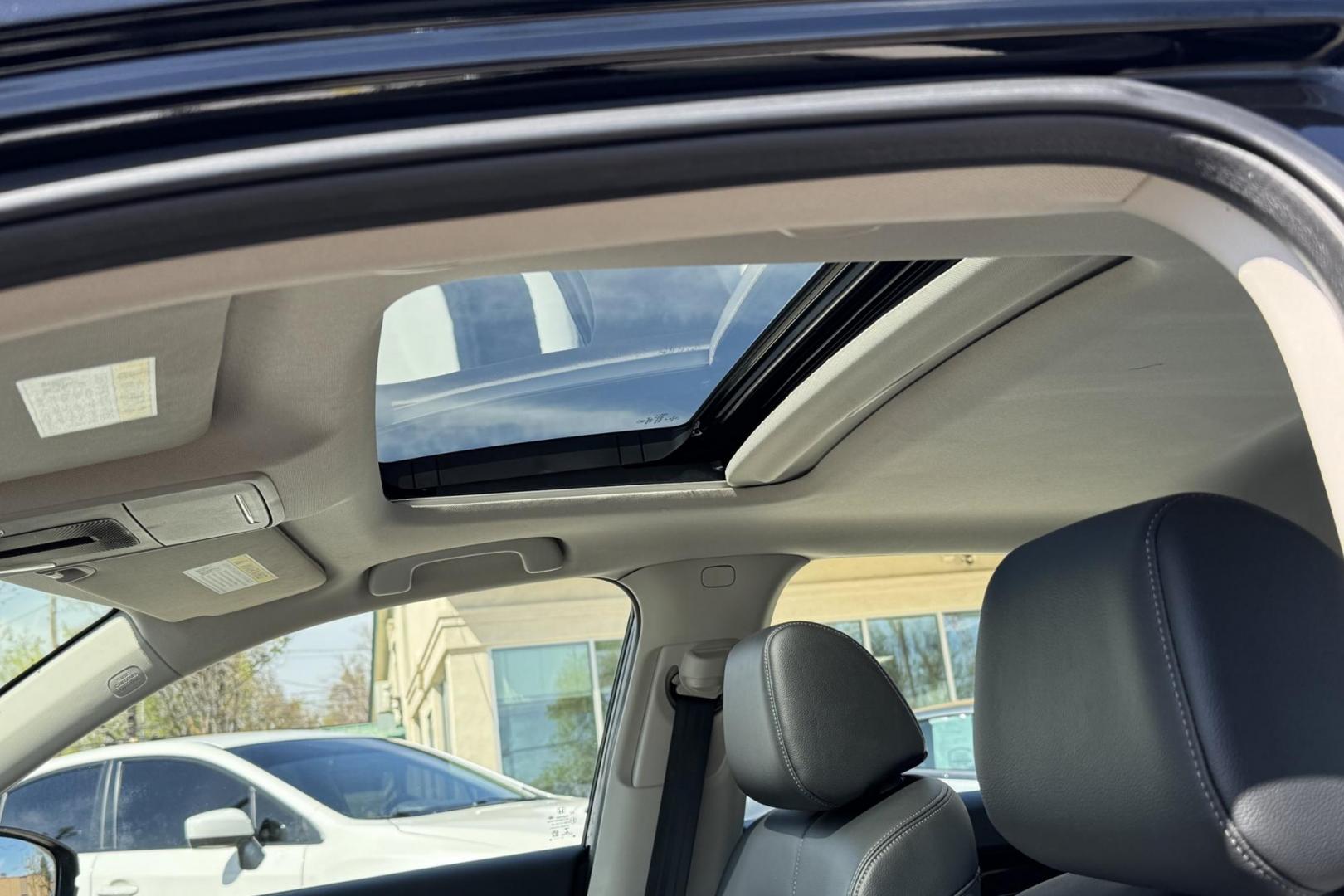 2022 Crystal Black Pearl /Black Honda Civic Touring (2HGFE1F95NH) with an 4 Cyl 1.5 Liter Turbo engine, Automatic transmission, located at 2304 W. Main St., Boise, ID, 83702, (208) 342-7777, 43.622105, -116.218658 - Remaining Factory Warranty! Great Cars! - Photo#4