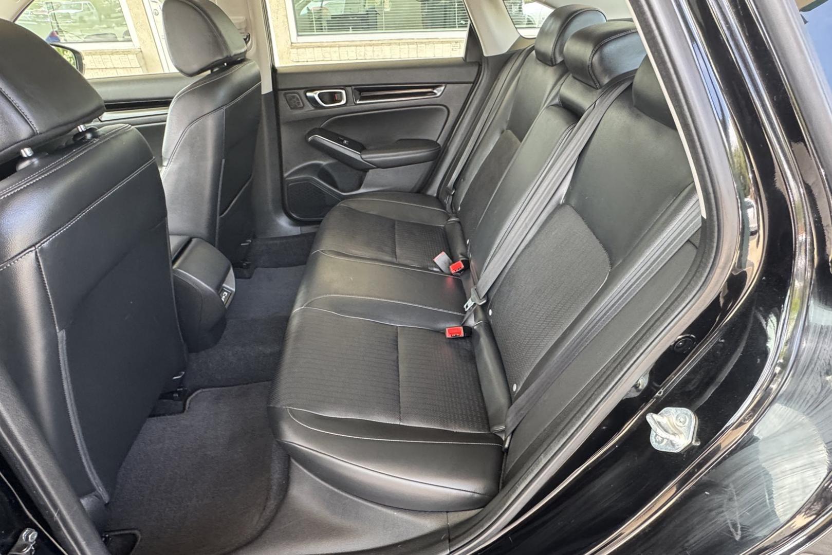 2022 Crystal Black Pearl /Black Honda Civic Touring (2HGFE1F95NH) with an 4 Cyl 1.5 Liter Turbo engine, Automatic transmission, located at 2304 W. Main St., Boise, ID, 83702, (208) 342-7777, 43.622105, -116.218658 - Remaining Factory Warranty! Great Cars! - Photo#13