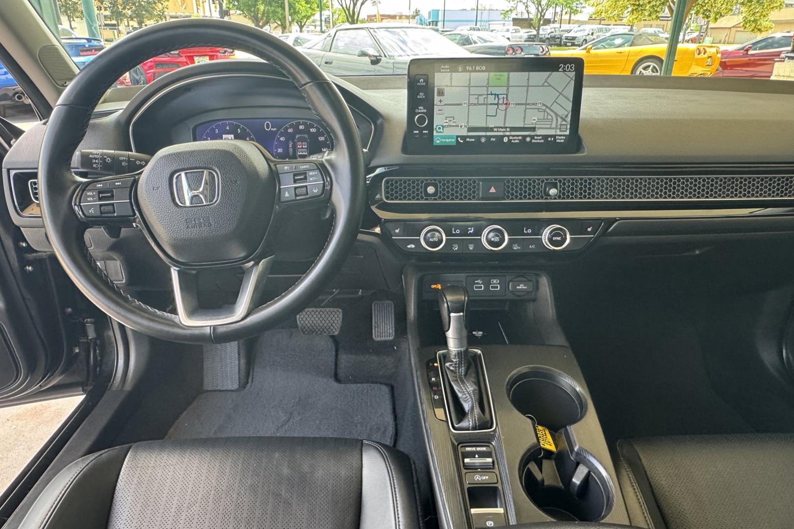 2022 Crystal Black Pearl /Black Honda Civic Touring (2HGFE1F95NH) with an 4 Cyl 1.5 Liter Turbo engine, Automatic transmission, located at 2304 W. Main St., Boise, ID, 83702, (208) 342-7777, 43.622105, -116.218658 - Remaining Factory Warranty! Great Cars! - Photo#17
