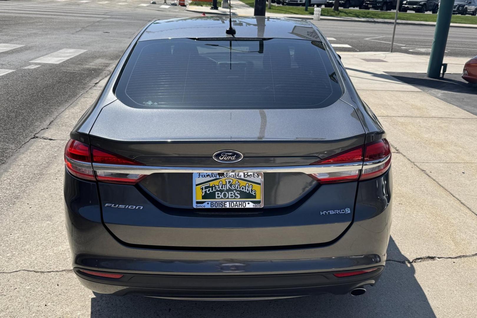 2018 Gray /Gray Ford Fusion Hybrid (3FA6P0UU9JR) with an 4 Cyl 2.0 Liter Hybrid engine, Automatic transmission, located at 2304 W. Main St., Boise, ID, 83702, (208) 342-7777, 43.622105, -116.218658 - New Tires! Great Fuel Economy! - Photo#1