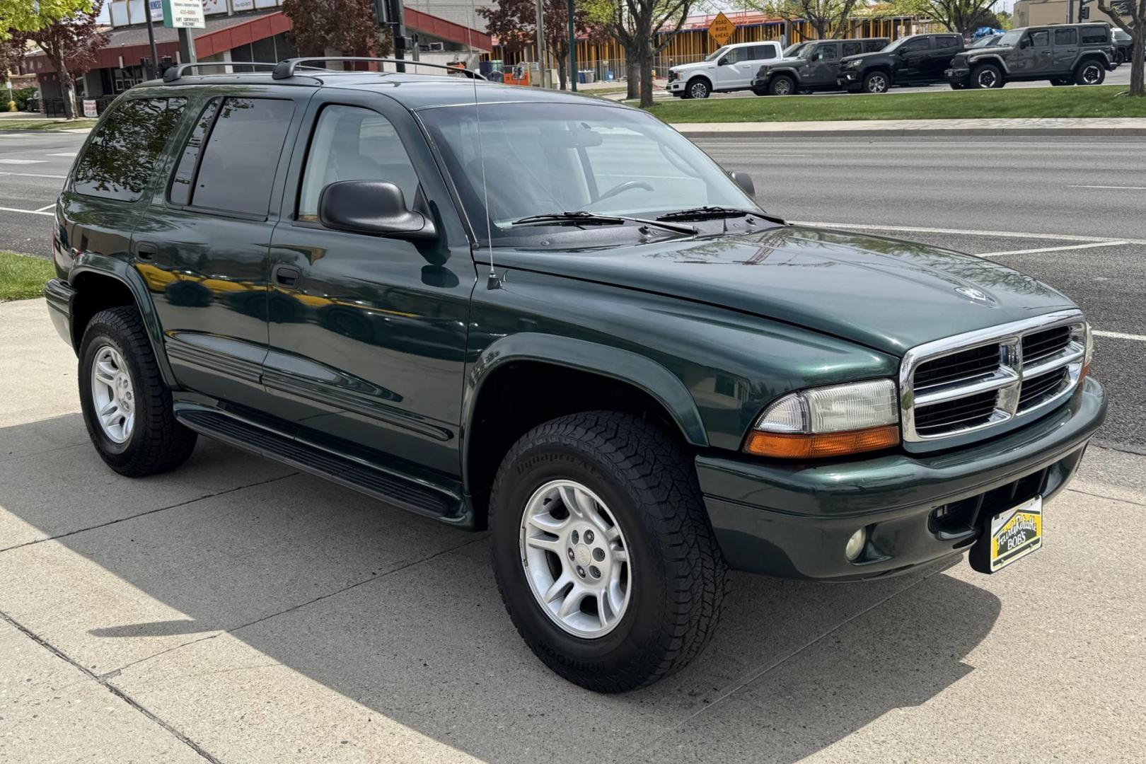 2002 Green /Gray Dodge Durango SLT (1B4HS48N62F) with an V8 4.7 Liter engine, Automatic transmission, located at 2304 W. Main St., Boise, ID, 83702, (208) 342-7777, 43.622105, -116.218658 - 8 Passenger! New Tires! Only 63k Miles! - Photo#1