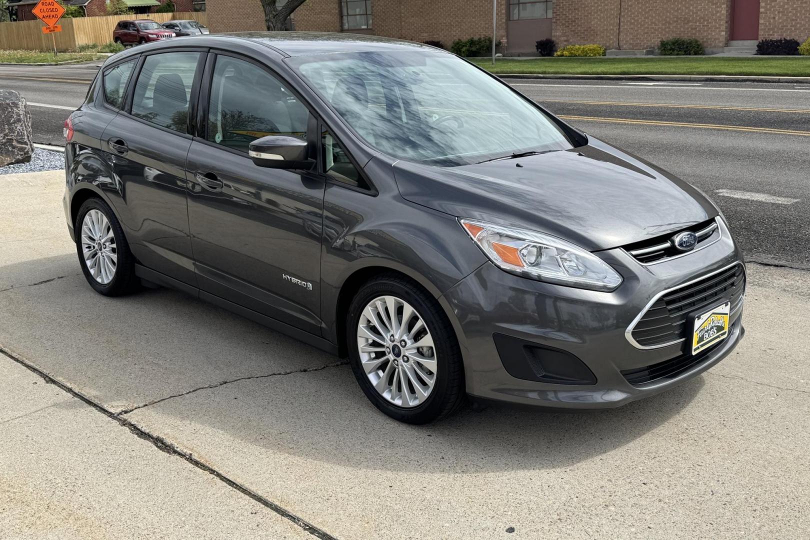 2017 Gray /Gray Ford C-Max Hybrid SE (1FADP5AU9HL) with an 4 Cyl 2.0 Liter Hybrid engine, Automatic transmission, located at 2304 W. Main St., Boise, ID, 83702, (208) 342-7777, 43.622105, -116.218658 - New Tires! Back Up Camera! Great Fuel Economy! - Photo#2