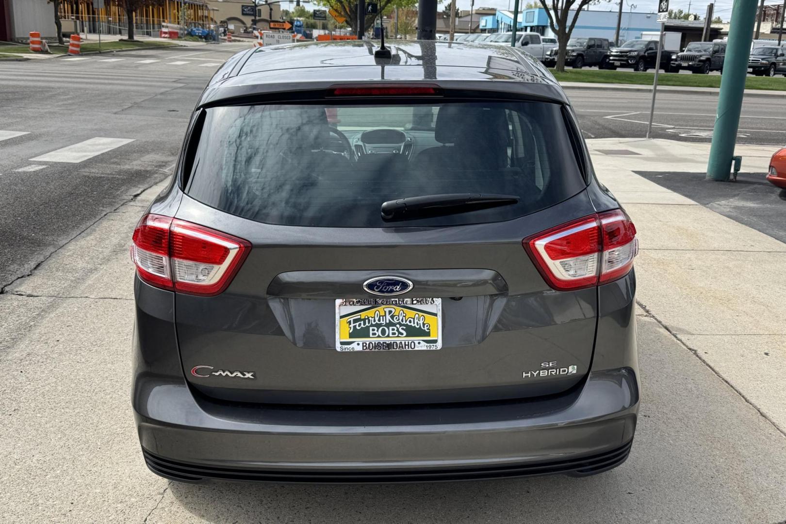2017 Gray /Gray Ford C-Max Hybrid SE (1FADP5AU9HL) with an 4 Cyl 2.0 Liter Hybrid engine, Automatic transmission, located at 2304 W. Main St., Boise, ID, 83702, (208) 342-7777, 43.622105, -116.218658 - New Tires! Back Up Camera! Great Fuel Economy! - Photo#1